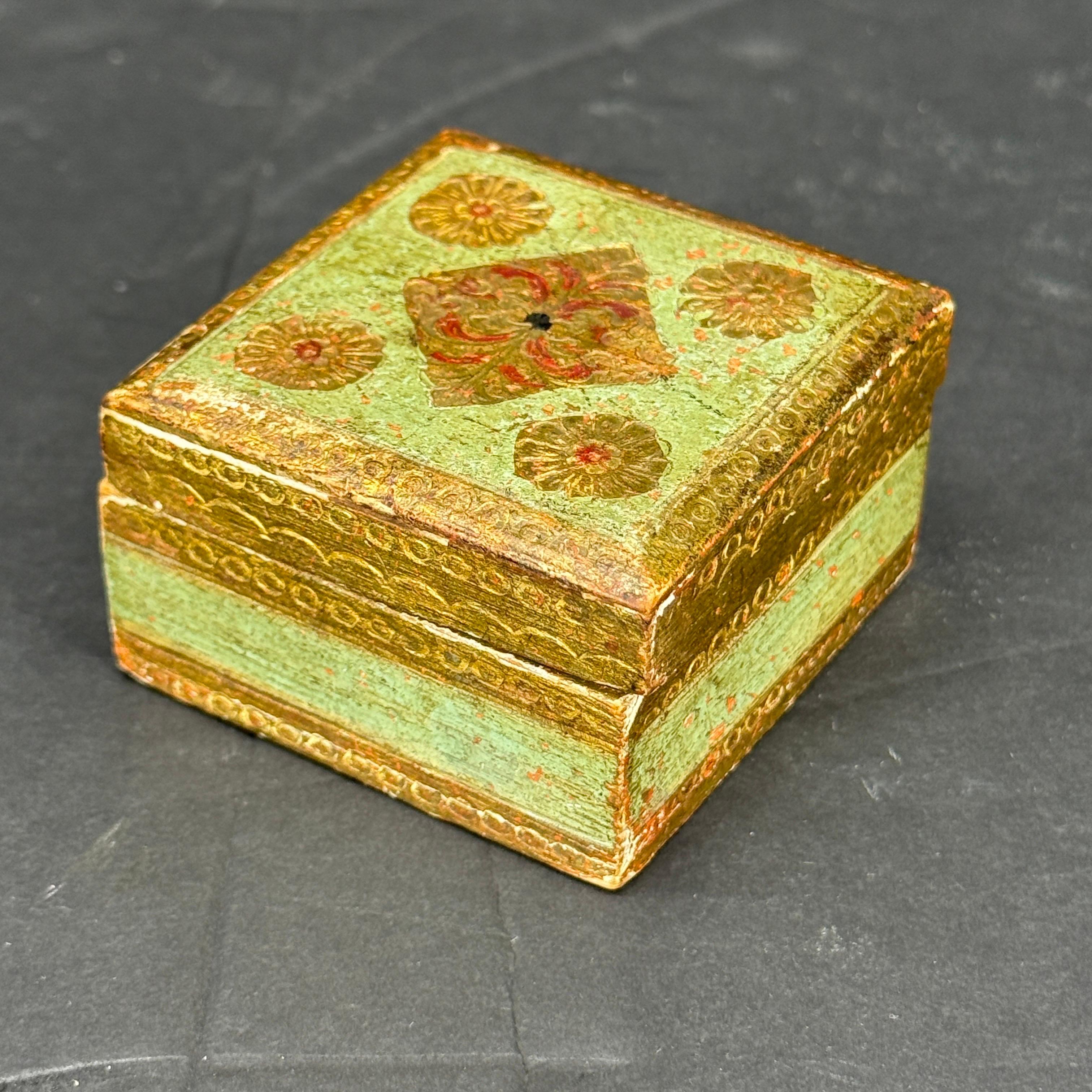 Charming Italian Mid-Century Florentine hand crafted ring box. This gilt-wood box can be used to store your favorite pieces of jewelry as well a stand alone piece on a coffee table as decoration. Great piece to add to a collection of these vintage