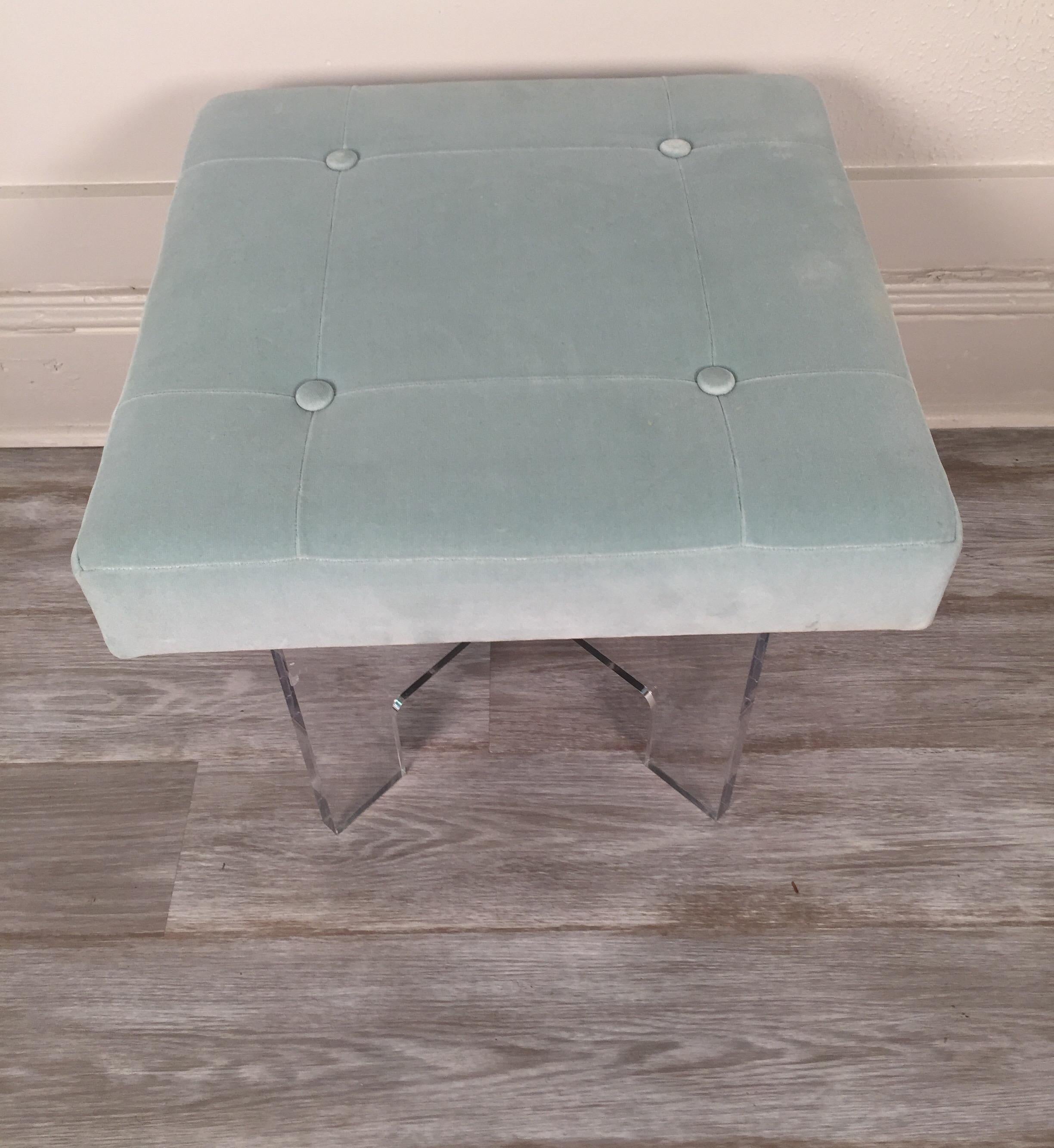 Small square Lucite bench or stool with baby blue velvet upholstery.