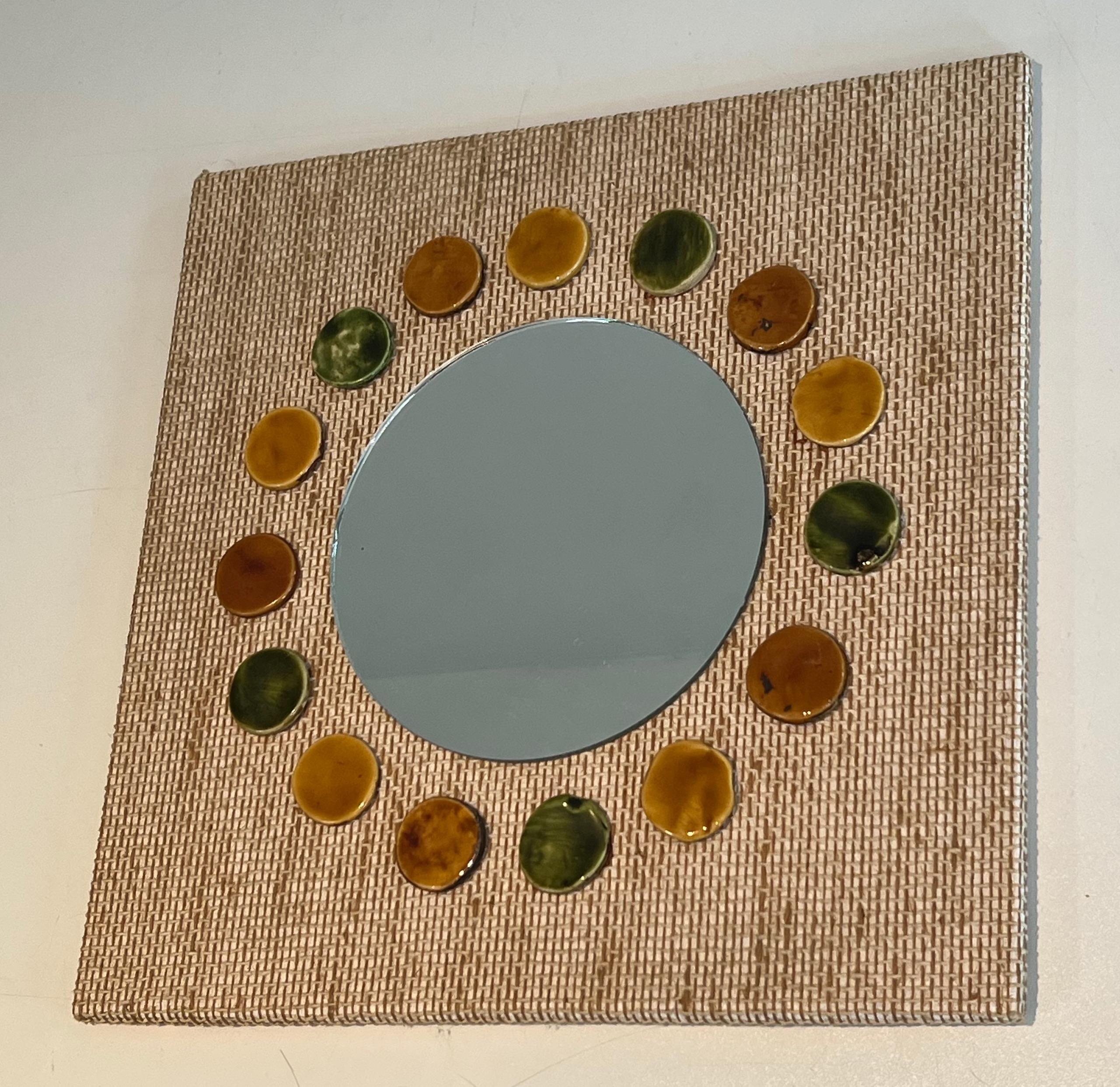 European Small square mirror made of raffia en colored ceramics round elements.  For Sale