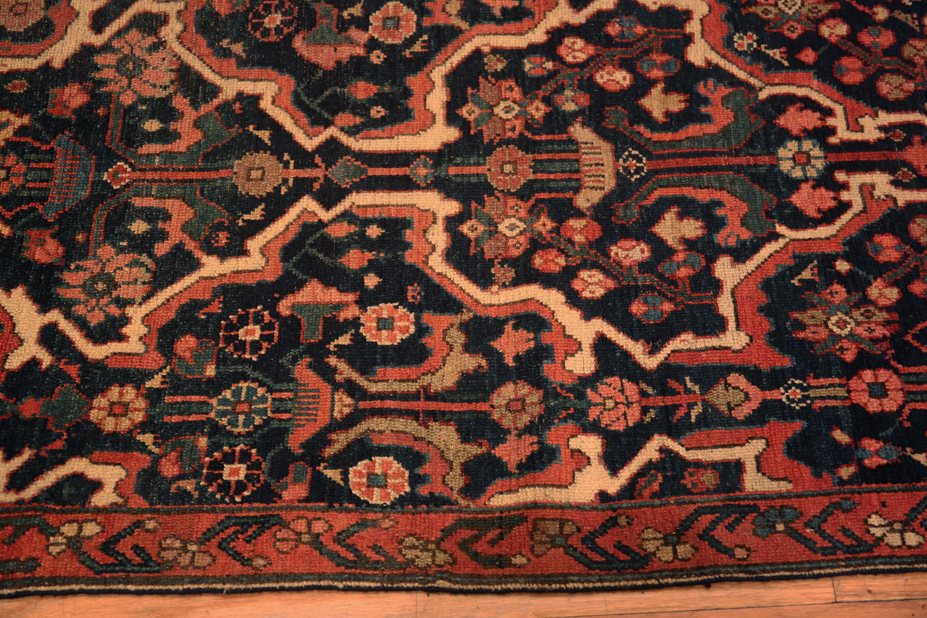 An Amazing Small Red And Blue Geometric Medallion Design Antique Persian Heriz Area Rug, Country of origin: Persian Rugs, Circa date: 1920