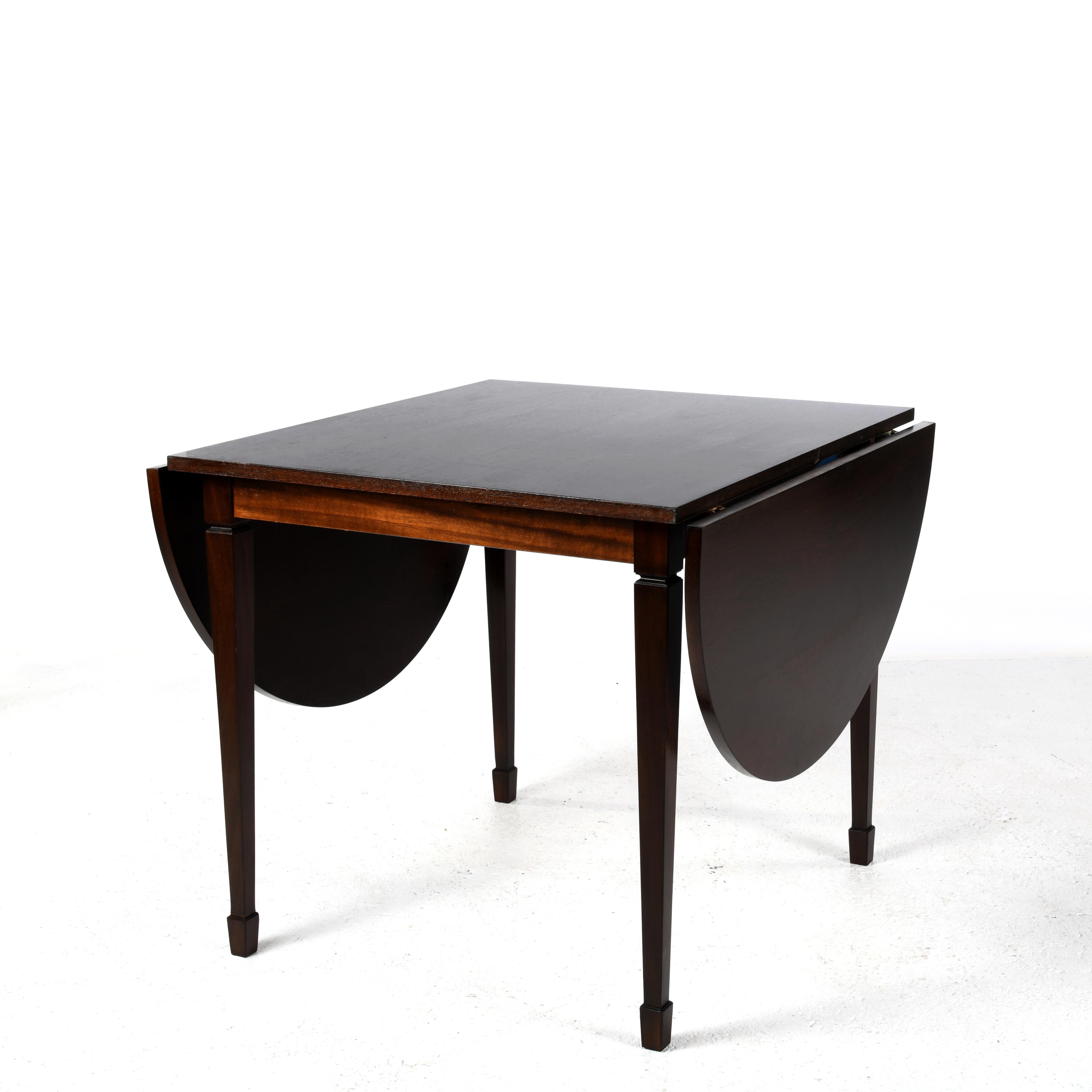 Danish Small square table with two rounded extensions forming an oval table For Sale