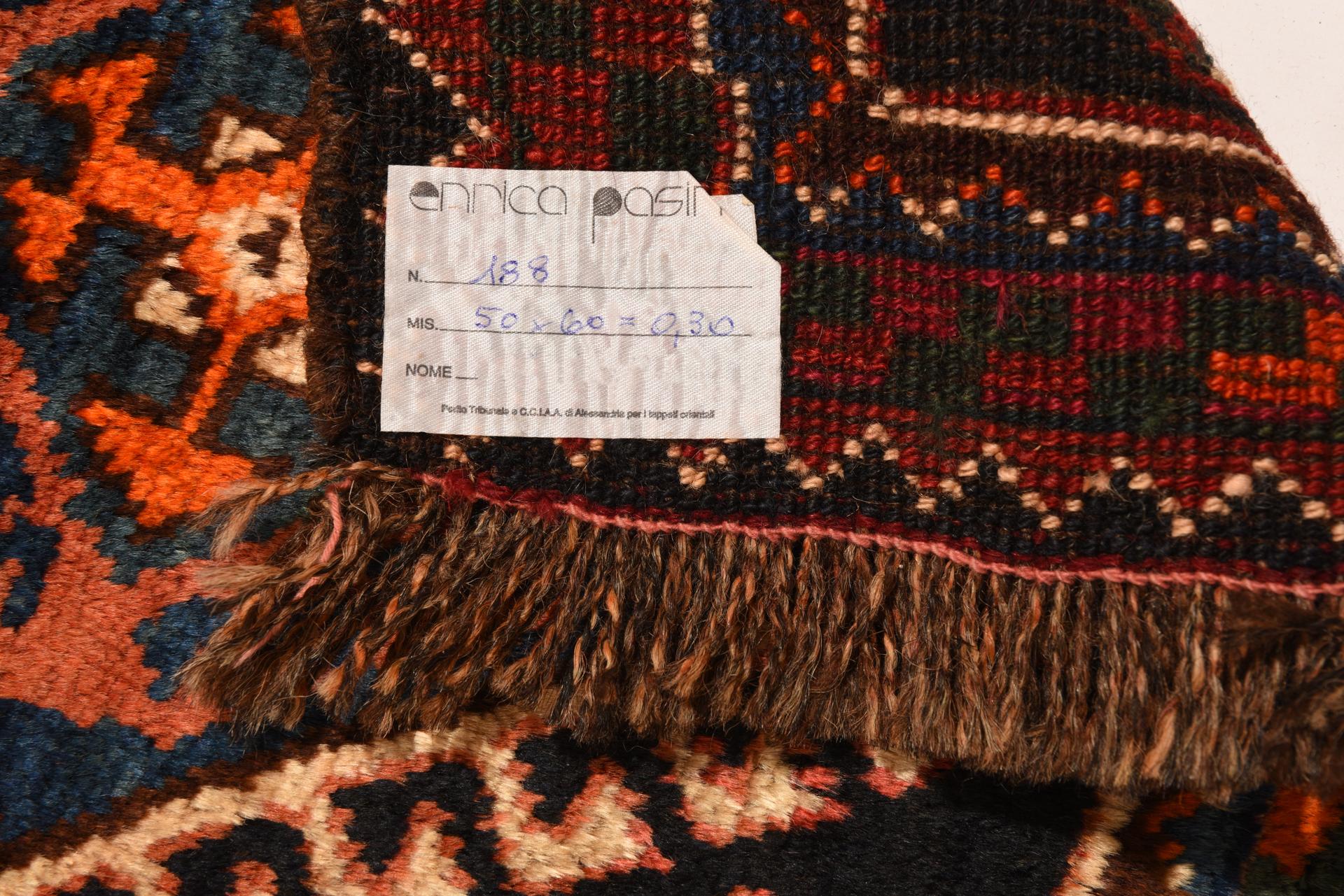 Interesting price for this small square rug (not a fragment) to put anywhere You want. It's the front of a saddlebag.
 Do You have a vase or a sculpture or an appliance and You don't want to ruin a piece of furniture? Put this rug under it.

ref.