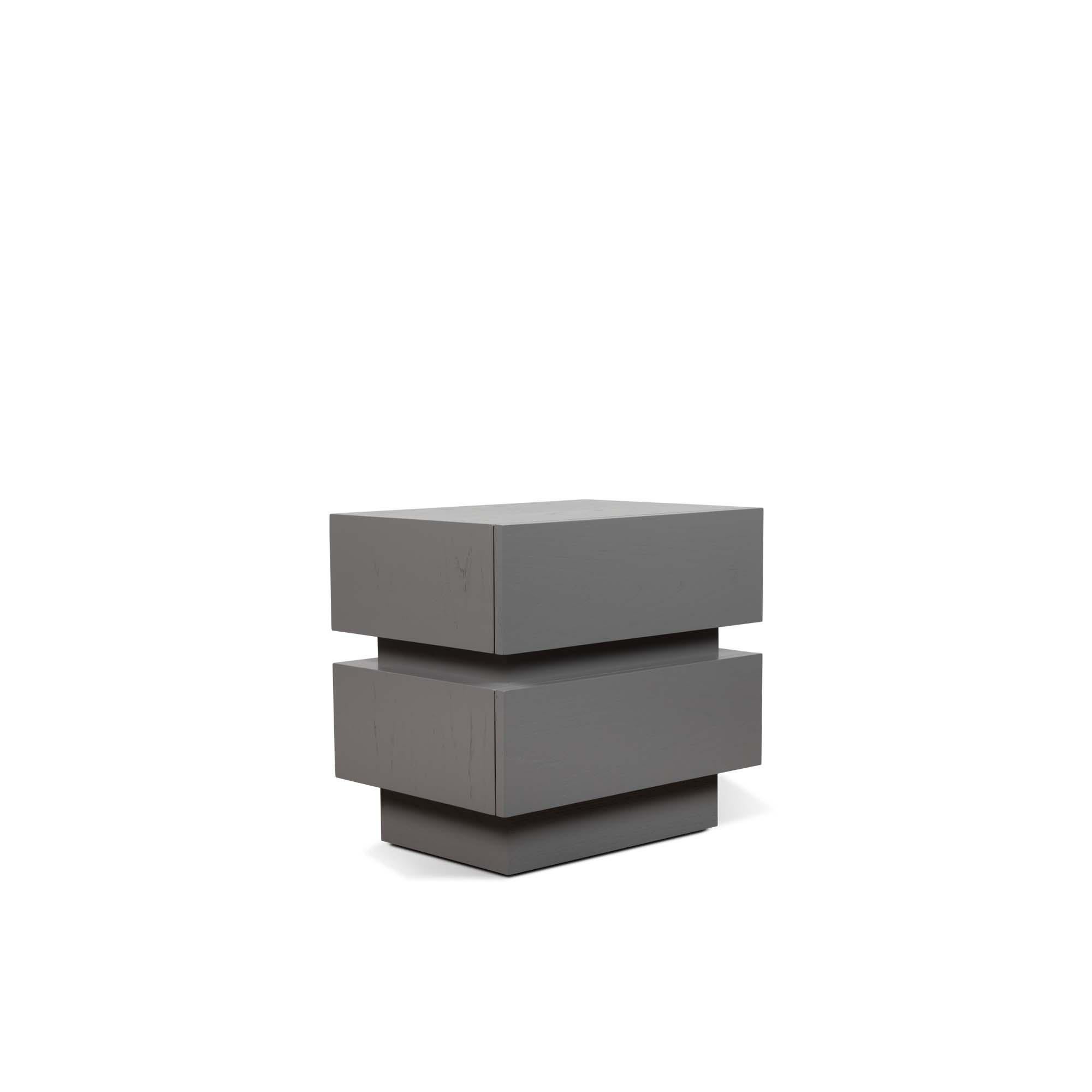 The stacked box nightstand is a bedside table with two drawers that is available in either American walnut or white oak. Available in two sizes. Shown here in Duxbury grey pigmented oak.

The Lawson-Fenning Collection is designed and handmade in Los