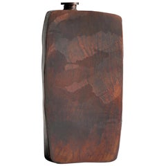 Bottiglia piccola in acciaio marrone di Lukasz Friedrich