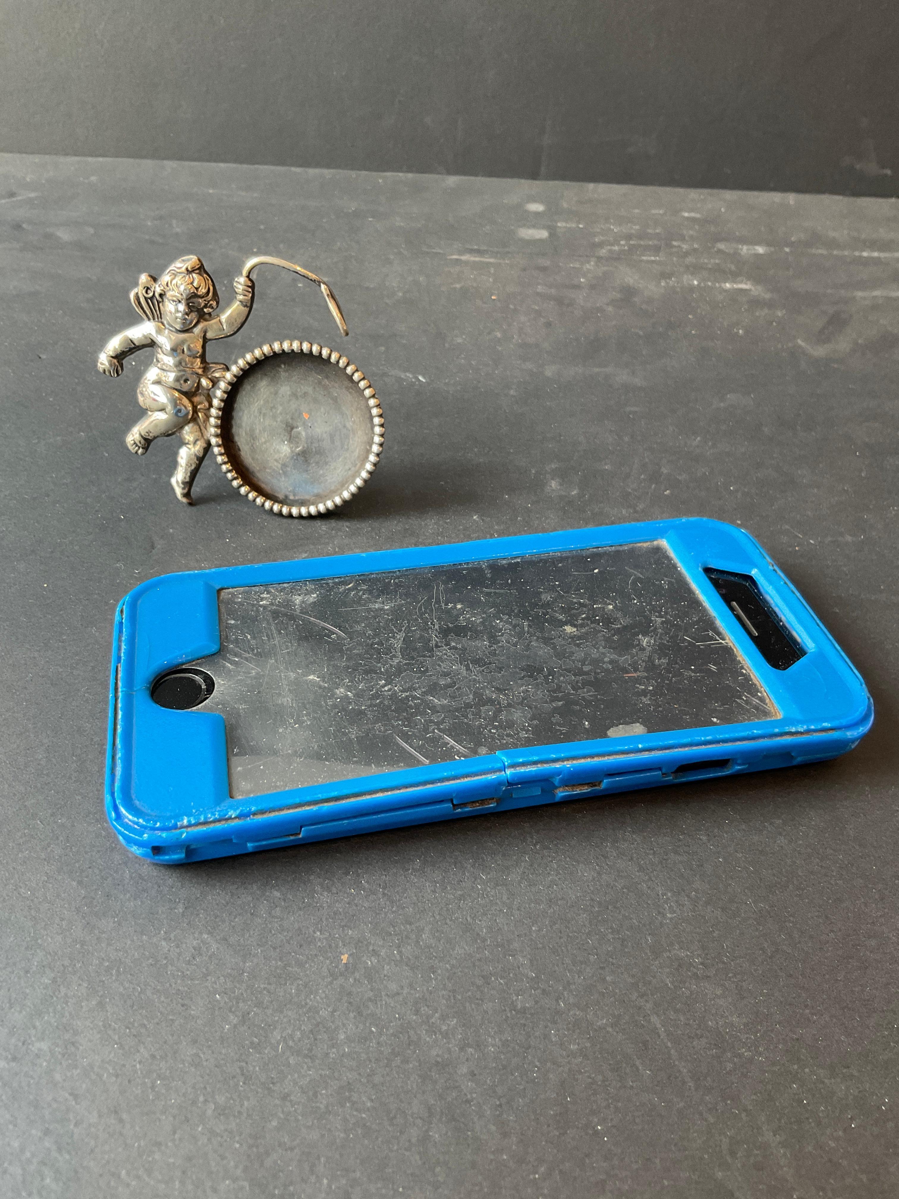 Piccola cornice a forma di cherubino in sterling del 1960. Senza vetro.