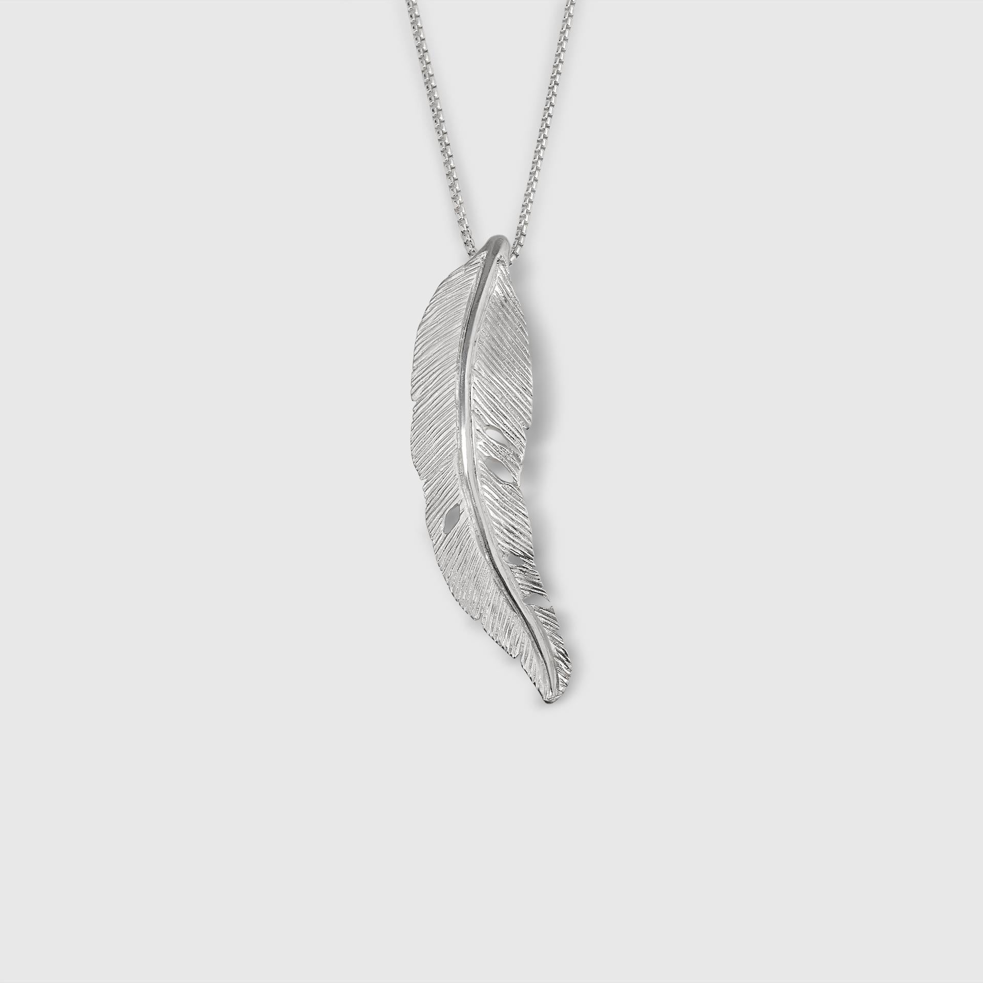 Small, Sterling Silver Detailed Feather Pendant by Ashley Childs

This feather was originally carved by 