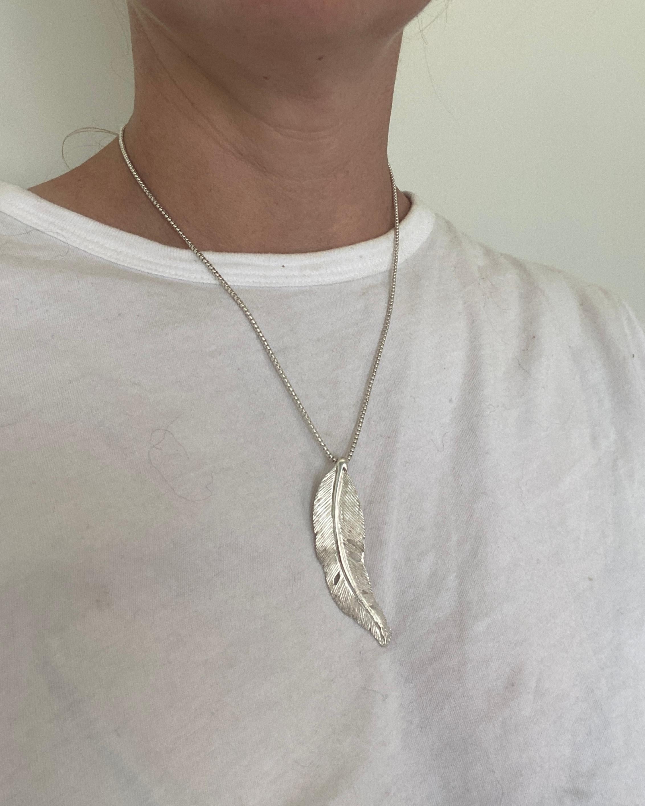 Contemporary Small, Sterling Silver Detailed Bird Feather Pendant by Ashley Childs For Sale
