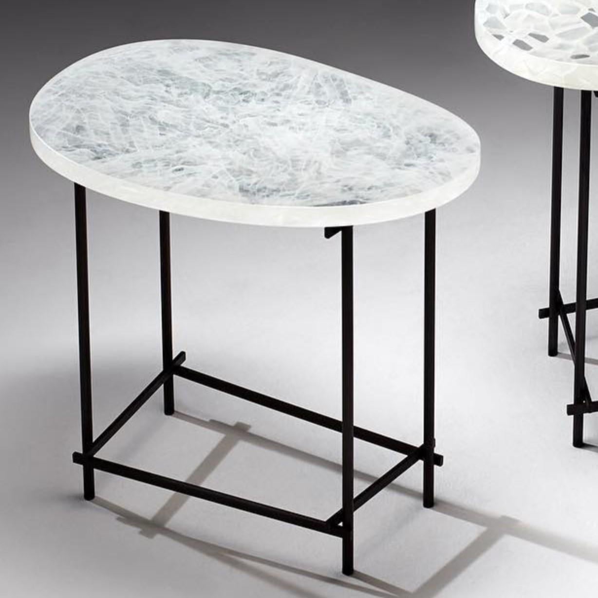 Small Stix Table by The GoodMan Studio
Dimensions: W 36 x D 55 x H 50 cm
Materials: Metal, Steel, Temple Glass - Lattice

Kilncast Temple glass. Hand made and polished
Glass and Steel Table base.

The Goodman Studio has been internationally
