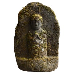 Small stone Buddha made in the Edo period in Japan/18th to 19th century
