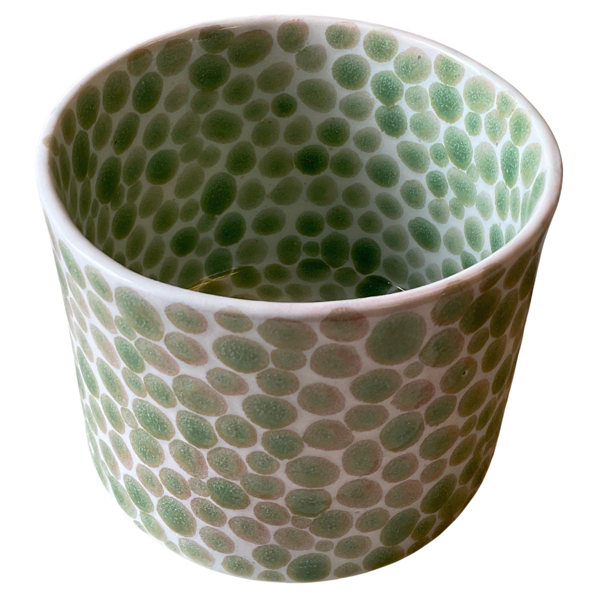 Small porcelain vase glazed with hand-painted green dots. Measures: 4.5