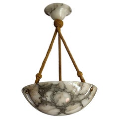 Small
Striking Art Deco Era Moon-Like Alabaster Pendant Light W. Original Rope Small
Striking Art Deco Era Moon-Like Alabaster Pendant Light W. Original Rope