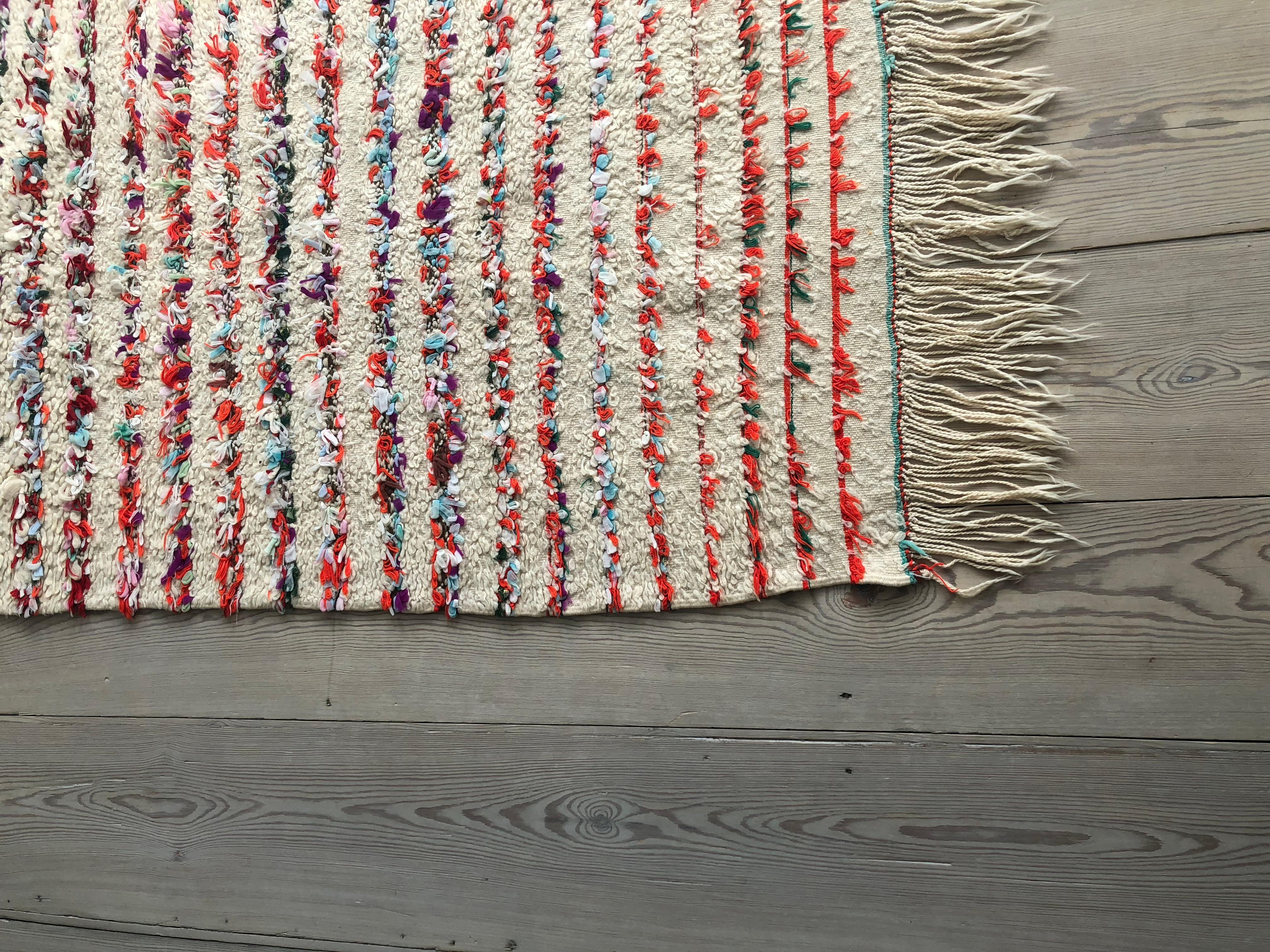 Beautiful small white Beni Ouarain rug with colourful stripes.