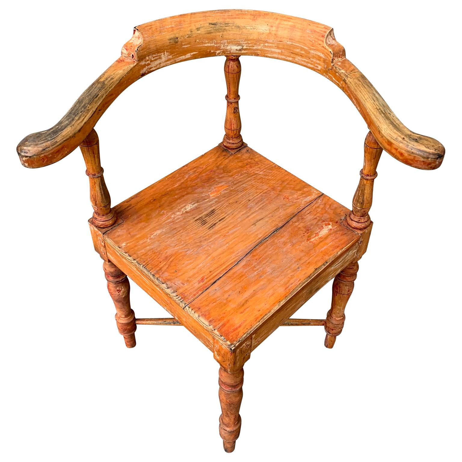 An 19th century Gustavian Folk Art corner armchair from the typical Swedish folk art category furniture. This armchair has been professionally restored, scraped to its original orange paint and patina.

 