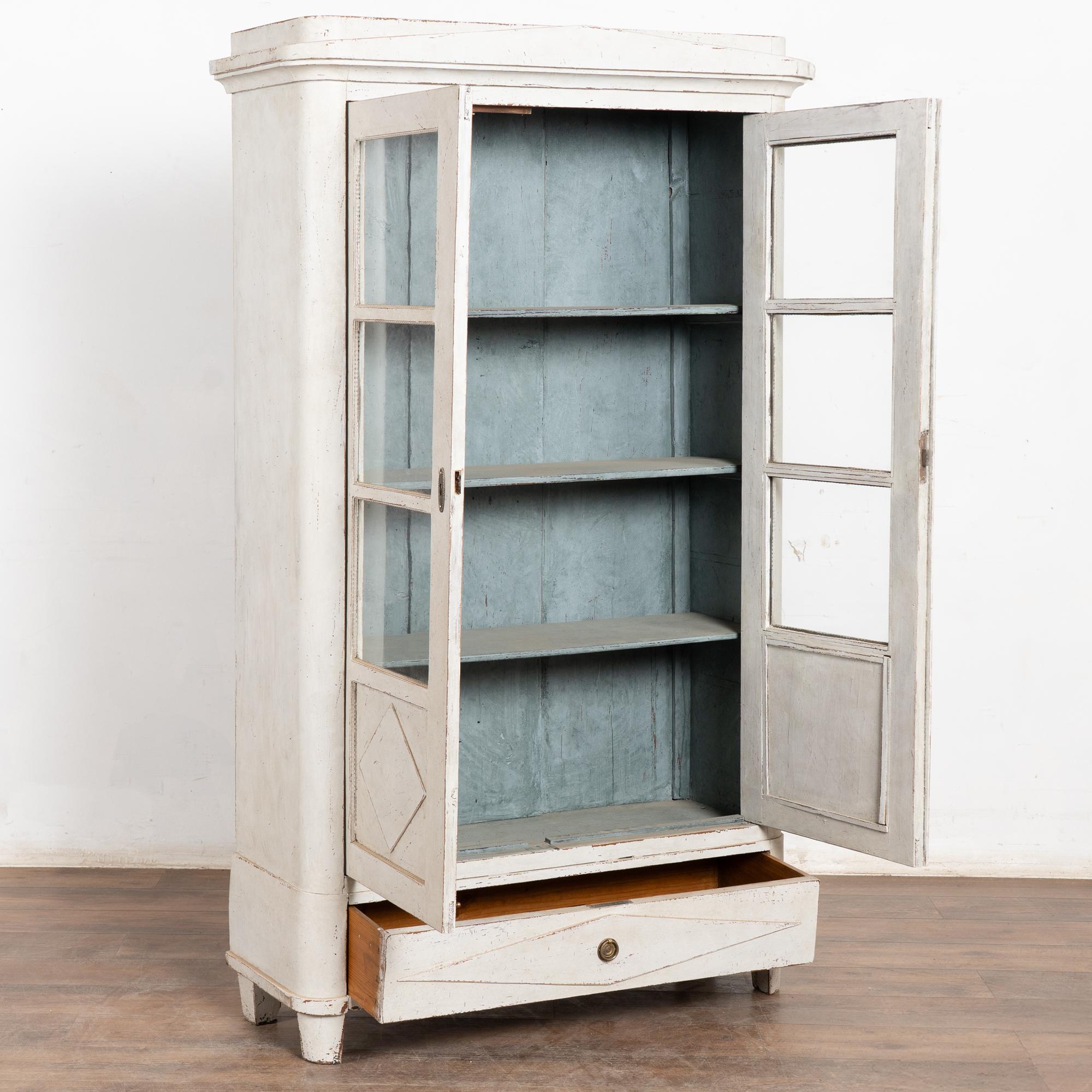 Hand-Crafted Small Swedish Gustavian pine bookcase featuring a professionally applied layered For Sale