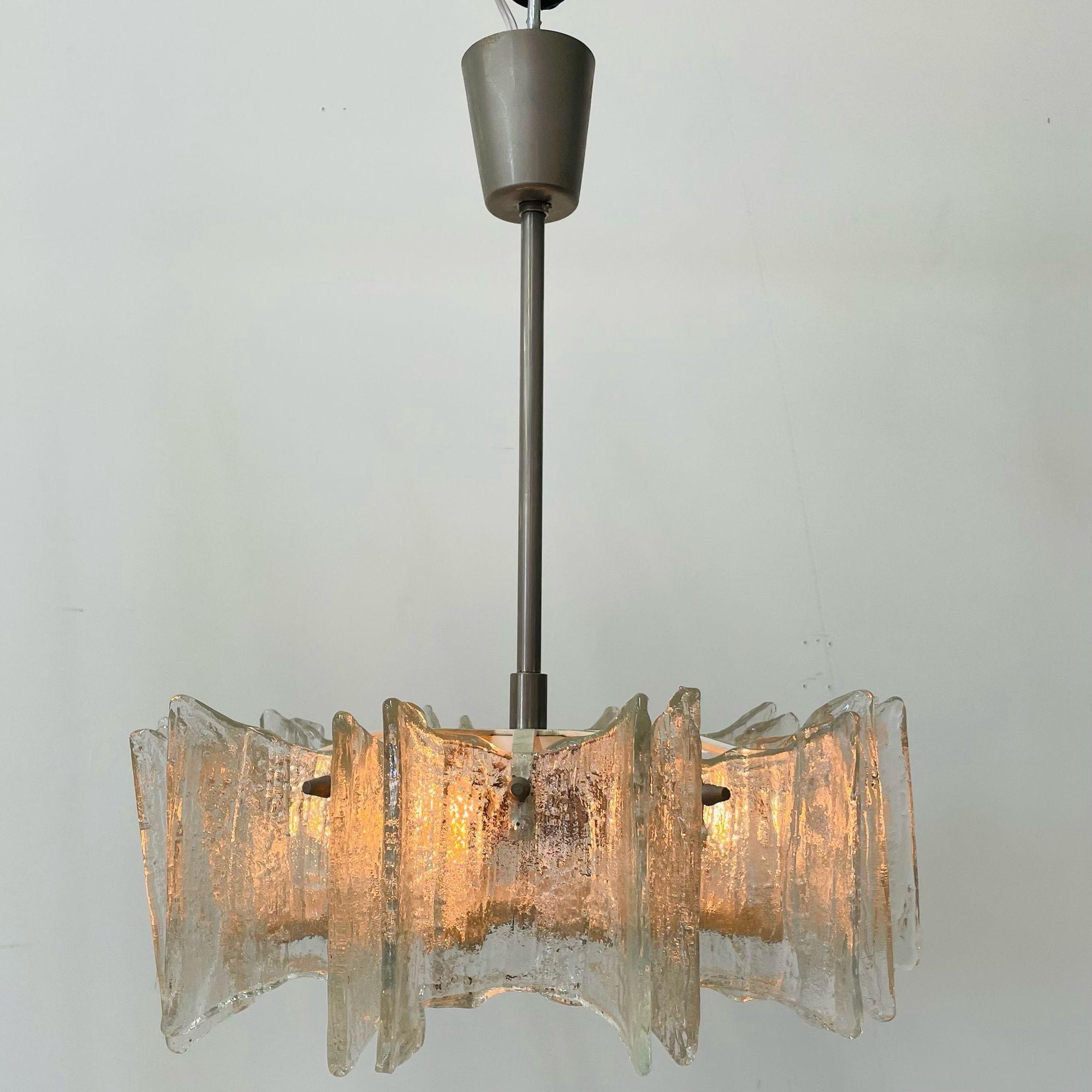 Small Swedish Mid-Century Modern Chandelier / Pendant, Slumped Glass and Brass
 
Slumped Glass, Brass
Sweden, 1950s
 
20 Height x 15.5 Diameter
4 x e17 midsize candelabra sockets.
