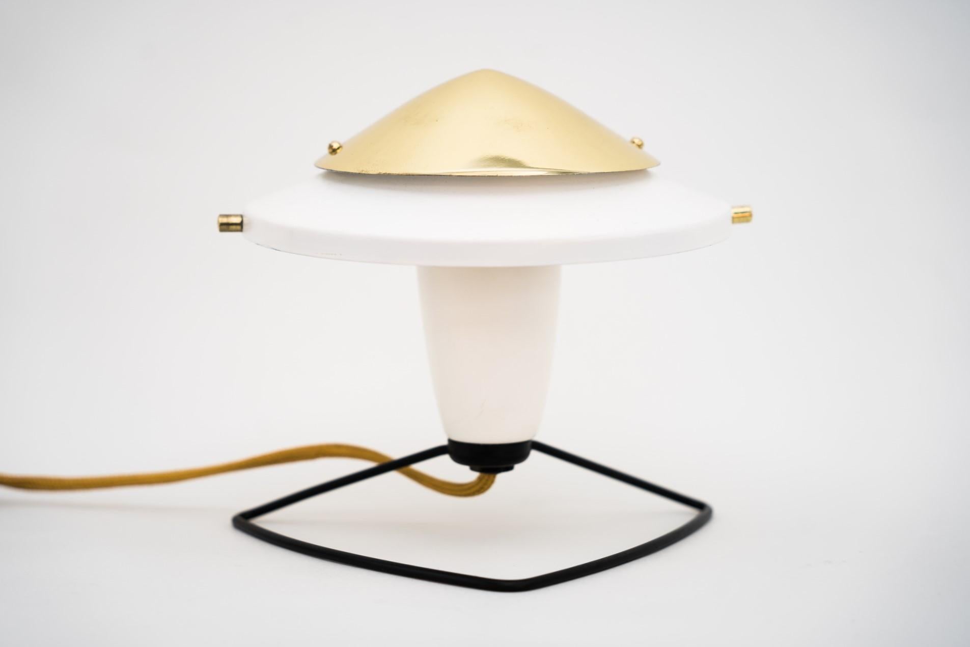 Small table lamp around 1960s
Polished and stove enamelled.