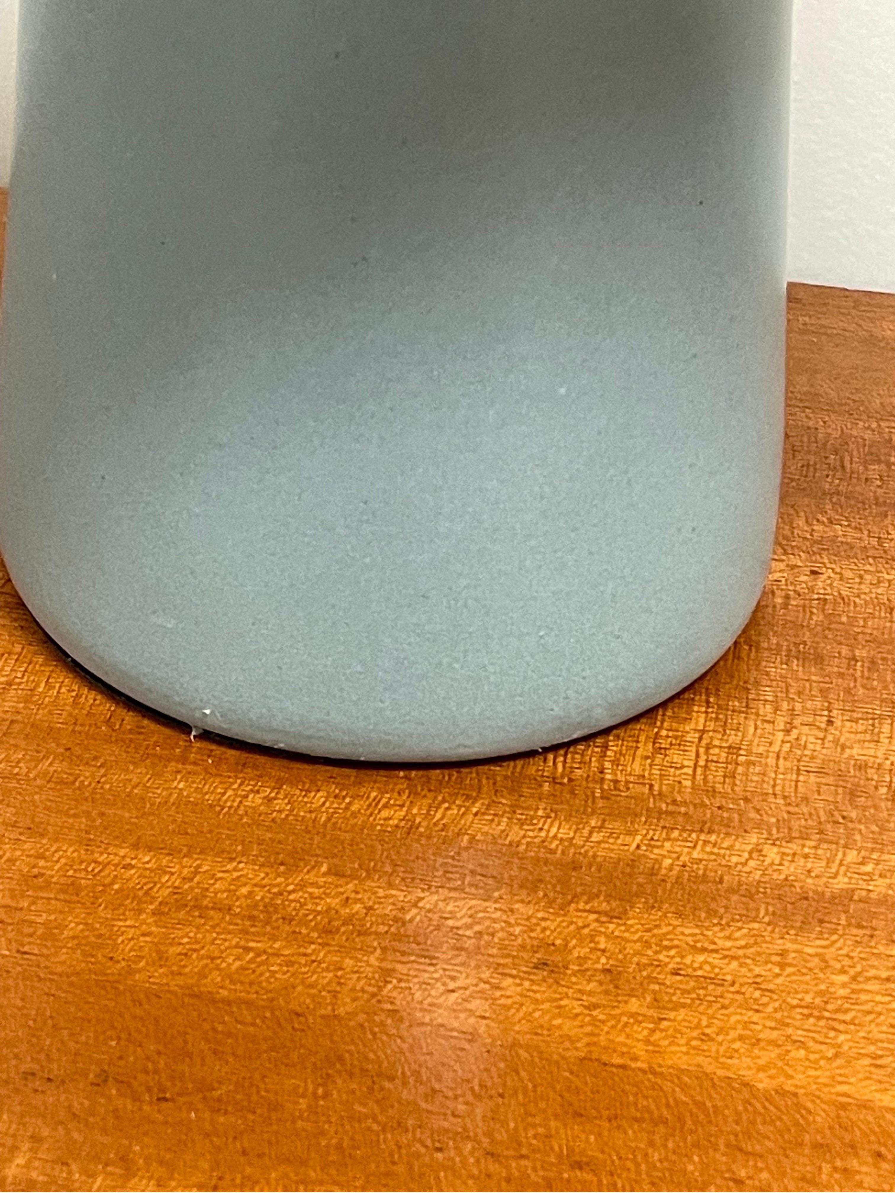 Small table lamp designed by famed ceramicist duo Jane and Gordon Martz for Marshall Studios. Robin's egg blue body. 

Overall dimensions:
14” tall
10” wide

Lamp only 
10” top socket
4.25” wide.