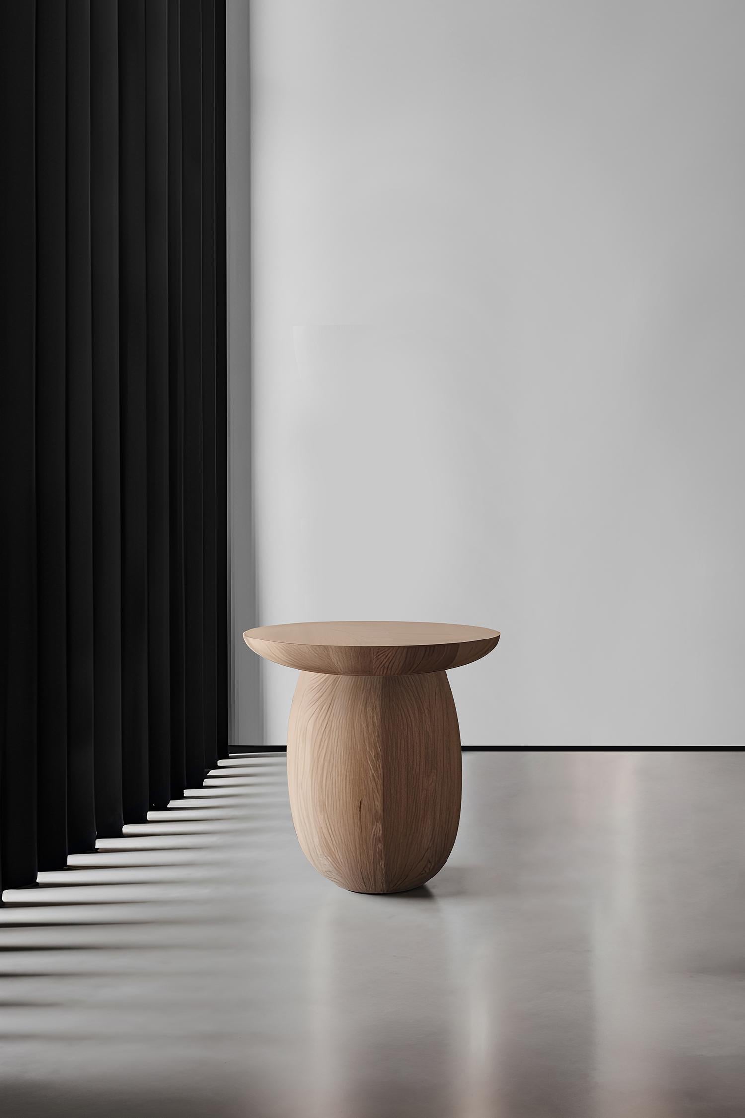 Introducing the Samu Collection by NONO, where simplicity meets elegance in the form of sculptural stools, side tables, and plinths. Each piece in this collection boasts a gently domed and smooth circular top, paired with a uniquely shaped base.