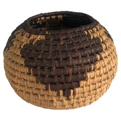 Small Tan and Brown Southwest Style Round Woven Decorative Basket