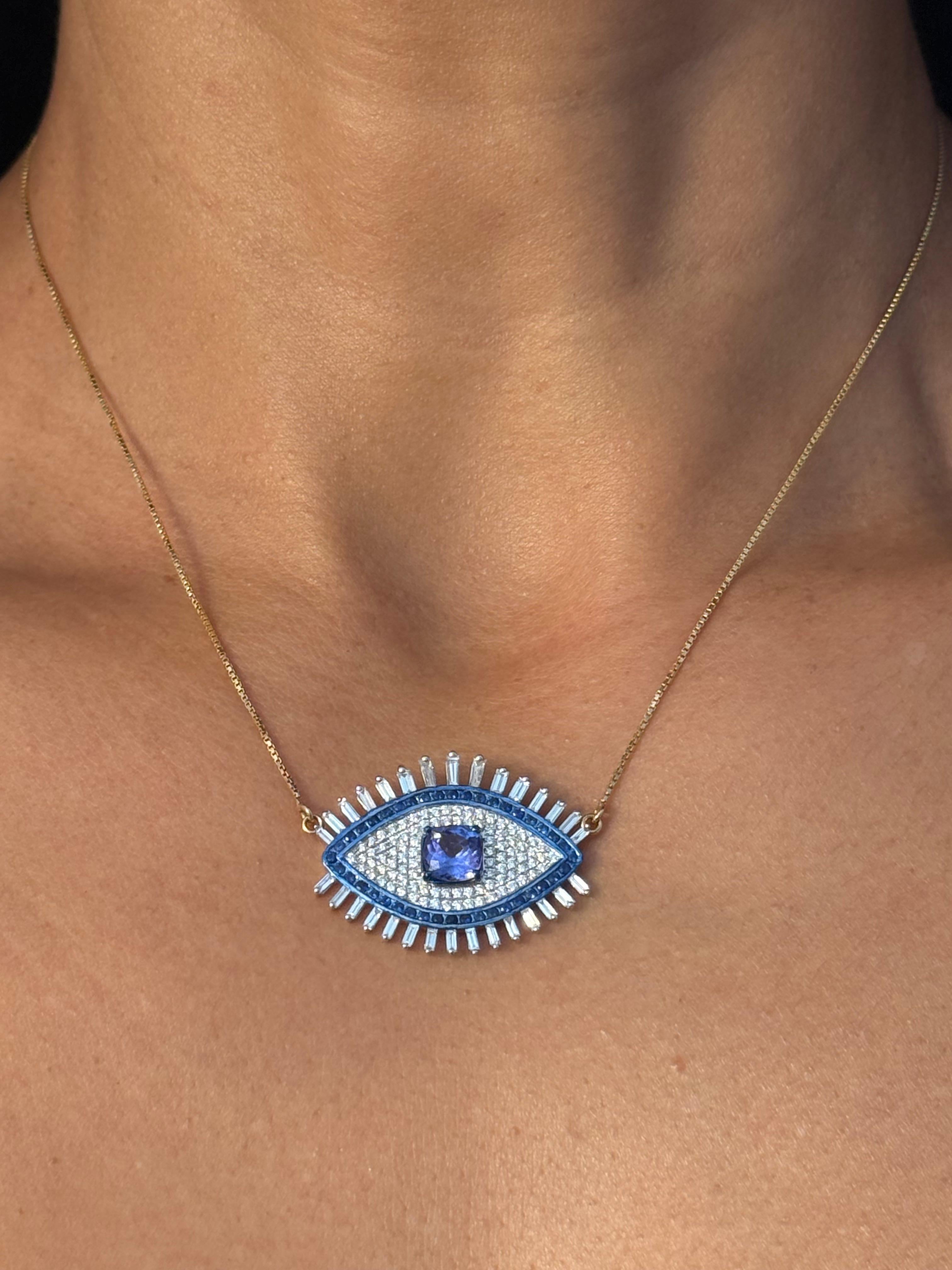 Piccolo ciondolo a forma di occhio maligno con tanzanite, diamante e zaffiro in oro 18 carati in vendita 5