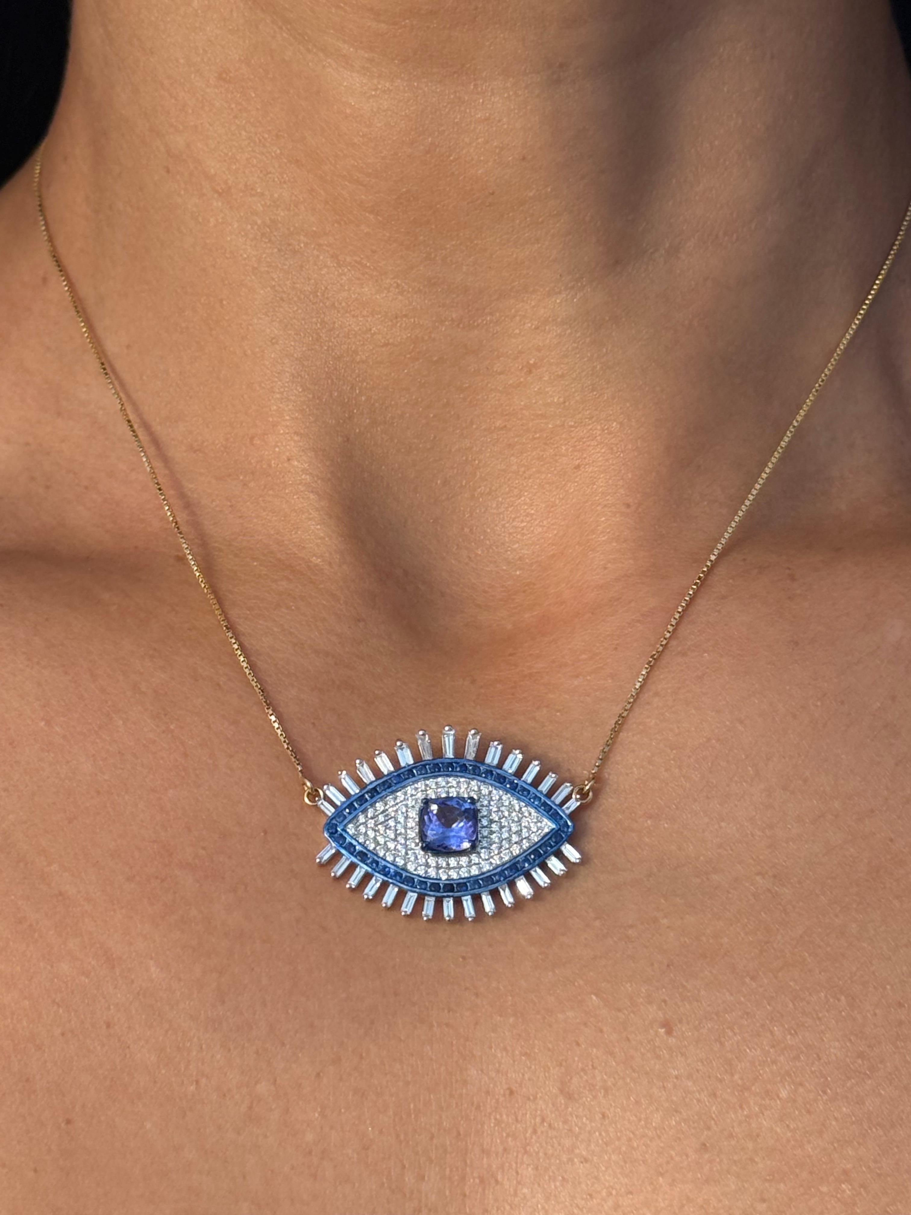 Piccolo ciondolo a forma di occhio maligno con tanzanite, diamante e zaffiro in oro 18 carati in vendita 6