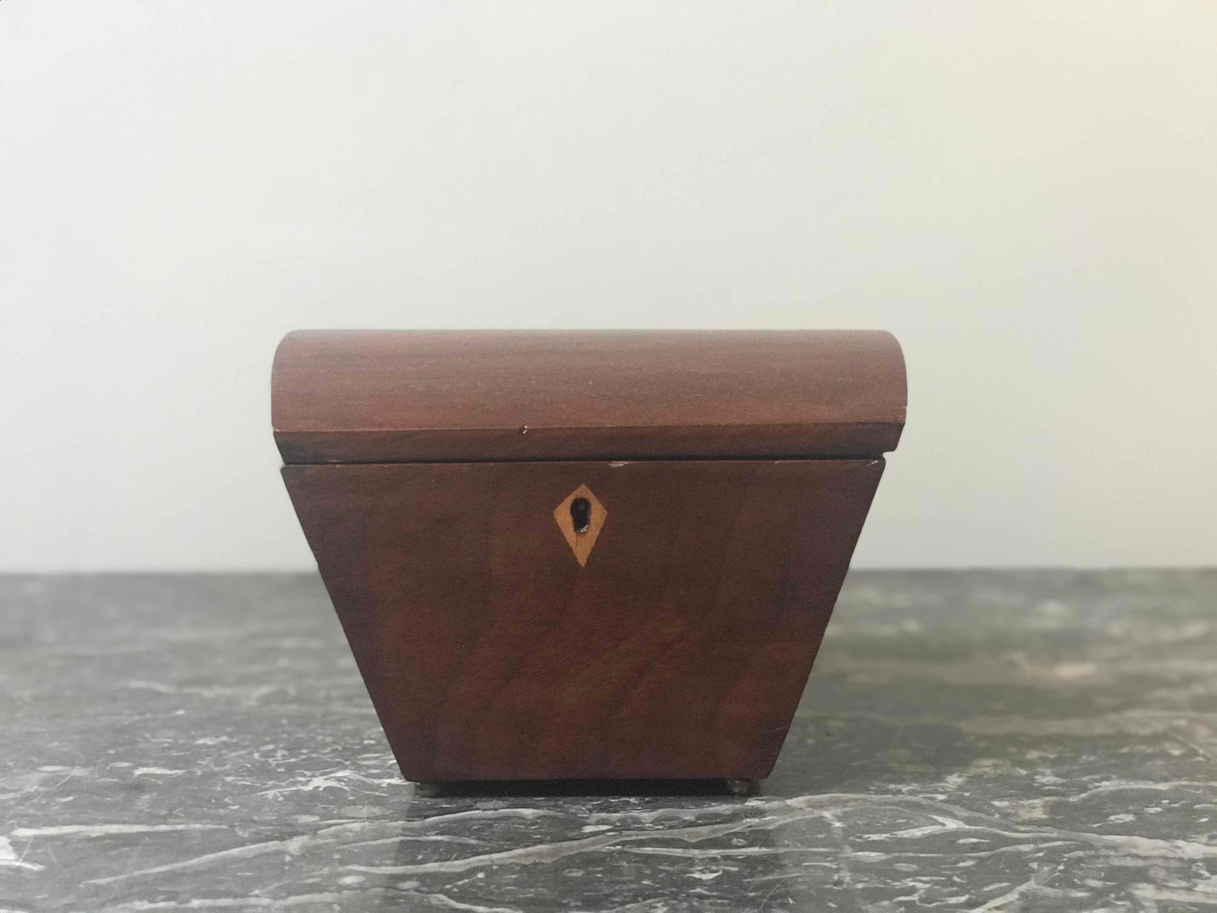 Small tapered tea caddy box from England circa 1840. 