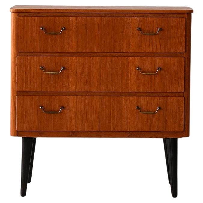 Small teak chest of drawers with metal handles For Sale