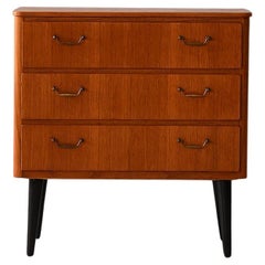 Small teak chest of drawers with metal handles