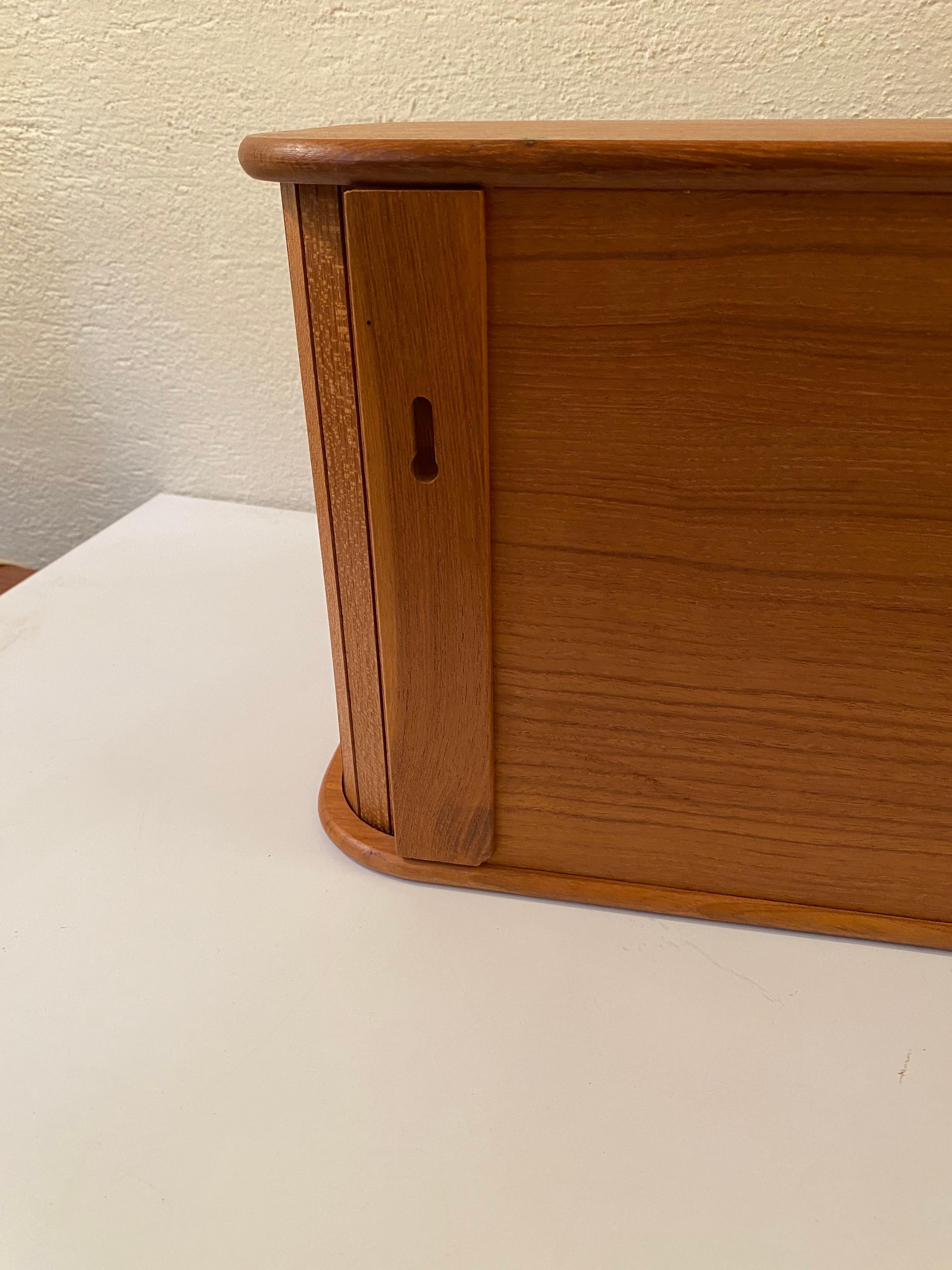 teak tambour storage dates