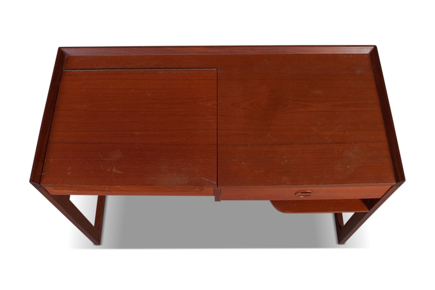 Origin: Denmark
Designer: Arne Wahl Iversen
Manufacturer: IKEA
Era: 1960s
Materials: Teak
Measurements: 39.5 wide x 17.75 deep x 29.5 tall.

Condition: In excellent original condition with light vintage wear. Price includes restoration.