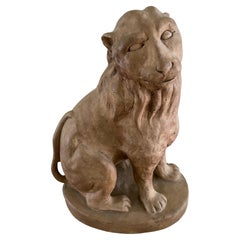 Petite sculpture de lion en terre cuite