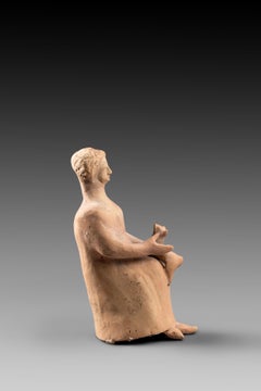 Small Terracotta Woman Figurine Holding a Dog, Greek Art