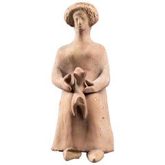 Small Terracotta Woman Figurine Holding a Dog, Greek Art