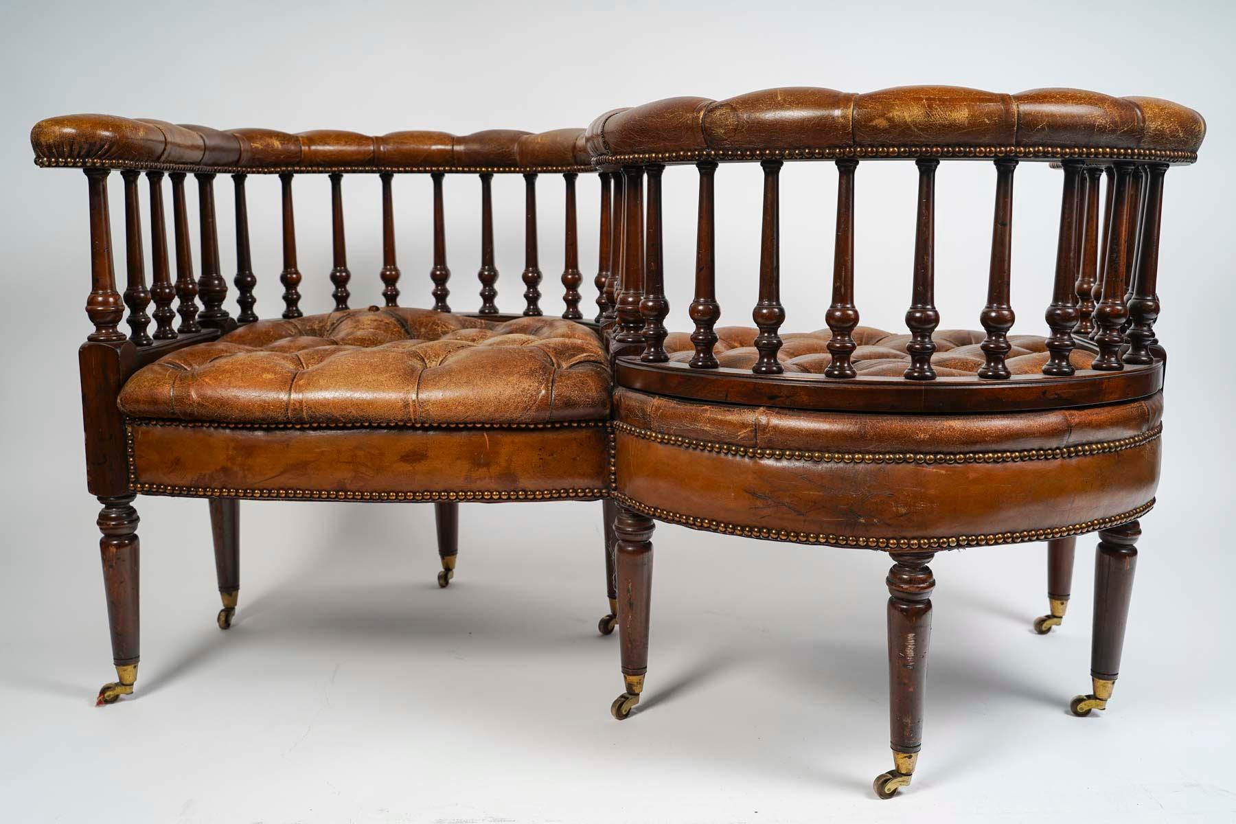 Small head to head sofa, Chesterfield confidant, Early 20th Century.

Small head to head sofa, Chesterfield confidant, early 20th century.
h: 73cm, w: 132cm, d: 85cm