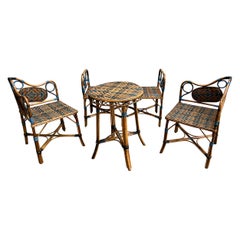 Small three-color woven rattan lounge, France circa 1930.