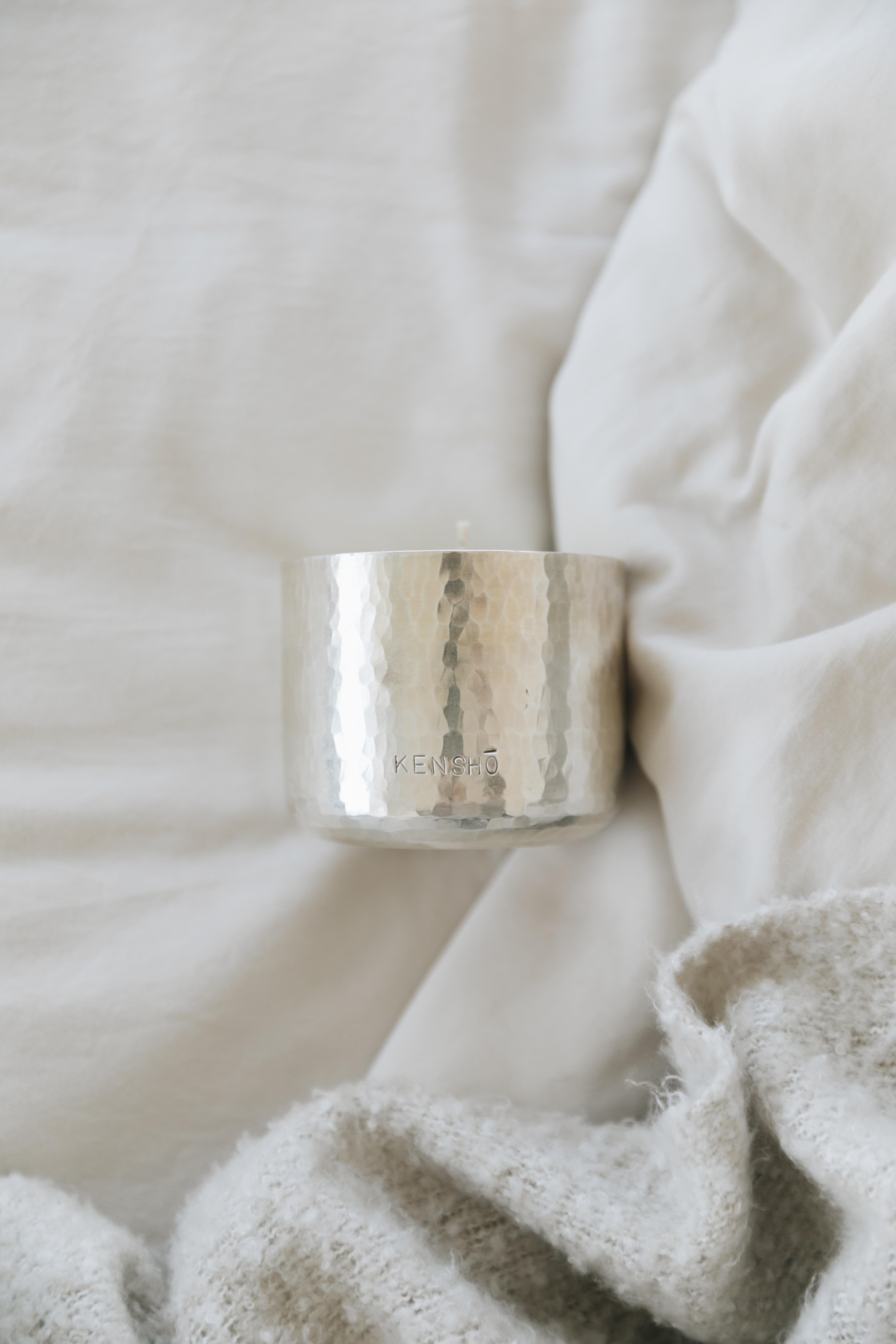 This stunning soy wax candle, crafted by skilled Mexican artisans, is a true work of art. The vase is made of hand-hammered copper with tin which gives it this silver color. It has an earthy, natural feel that fits perfectly with any home decor.