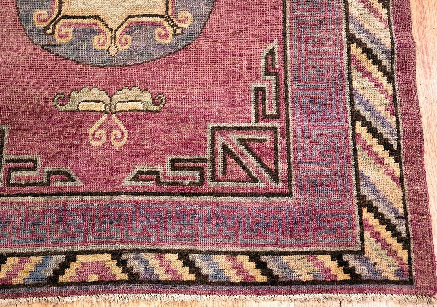 East Turkestani Small Tribal Purple Antique Khotan Rug. Size: 4 ft x 8 ft (1.22 m x 2.44 m)