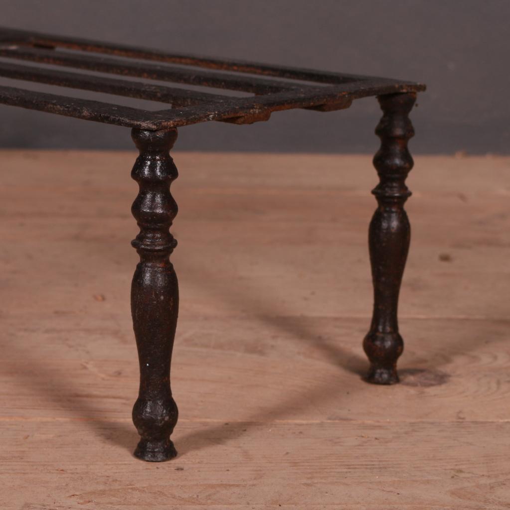 Small metal 19th century trivet stand, 1890.

Dimensions:
27.5 inches (70 cms) wide
9 inches (23 cms) deep
7.5 inches (19 cms) high.