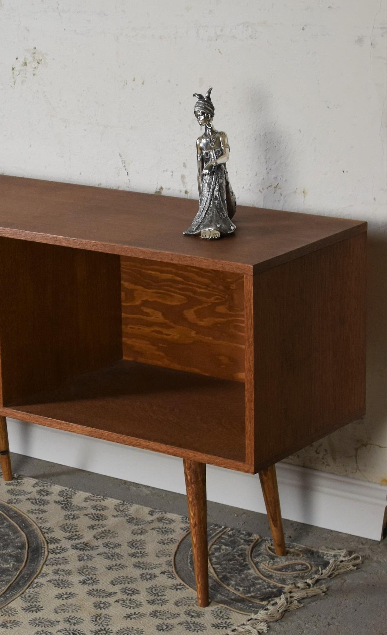 Small TV Open Cabinet by Pastform
Dimensions: D 40 x W 180 x H 75 cm.
Materials: Stained and varnished wood.

Available in different wood color finishes: Whiskey, Rum, BPA, Nobel, Brandy, Schwarz, Natura, Honey, Dark Brown, Nevada, and Cognac.