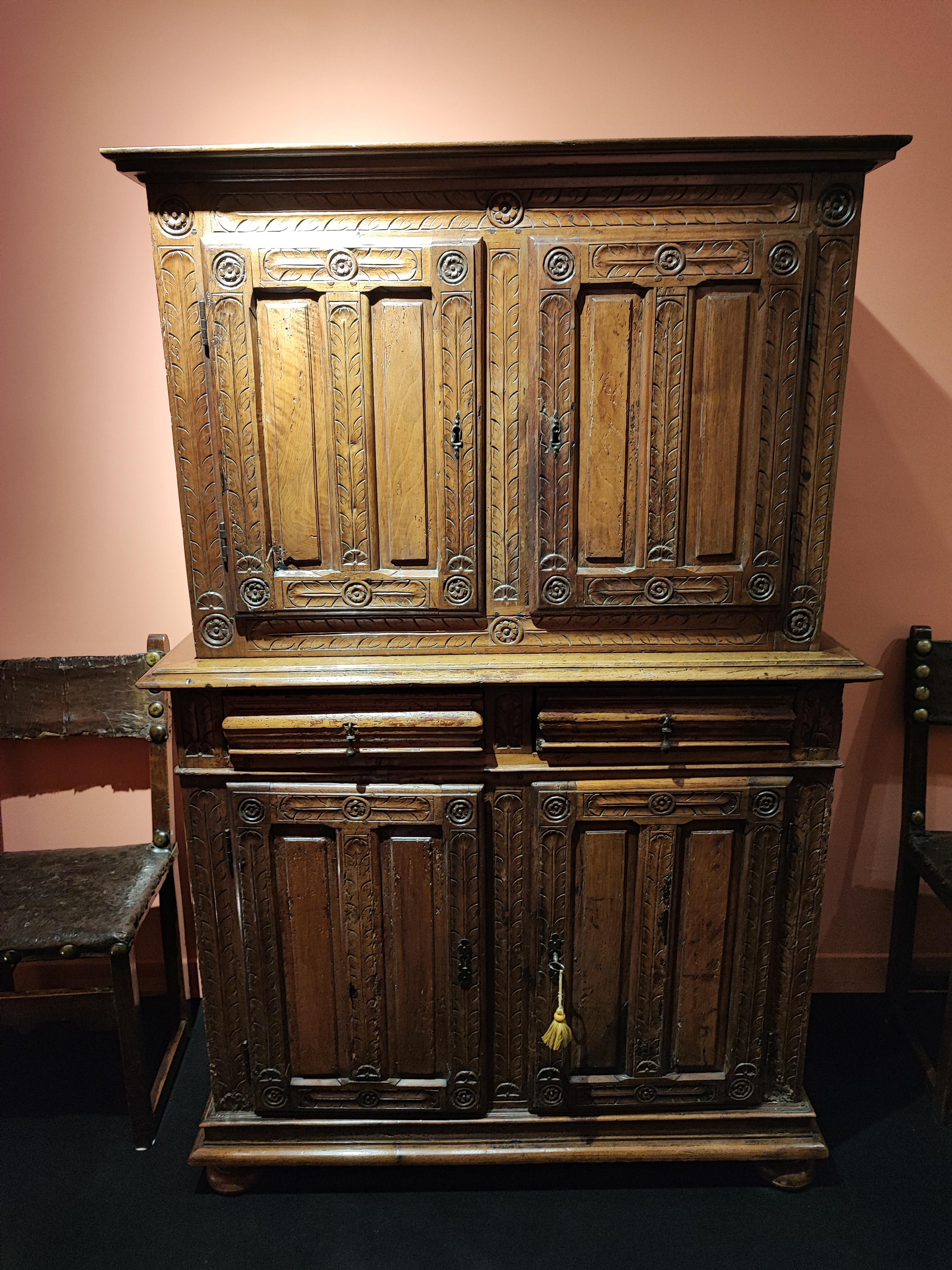 Small two-body buffet decorated with bird feathers

ORIGIN : FRANCE
PERIOD : 16th CENTURY

Measures: height: 170 cm
length: 106 cm
depth: 51 cm 

Walnut wood



This charming cabinet presents a great unity of ornamentation with its