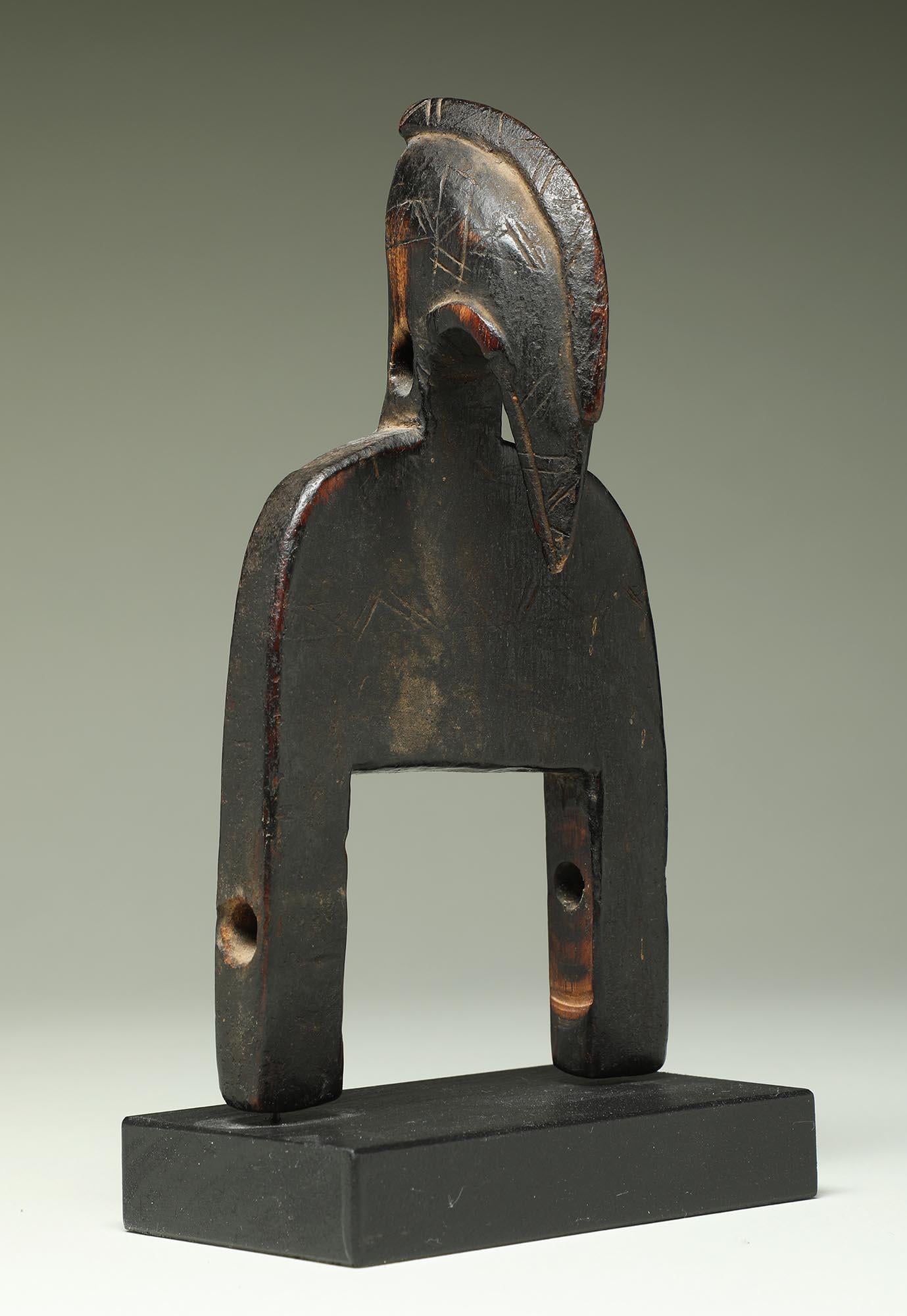 Kleiner verwendeter Senufo-Webstuhl mit Vogelschnabelkopf-Gesicht und Schafshalsband, Elfenbeinküste Afrika (Holz) im Angebot