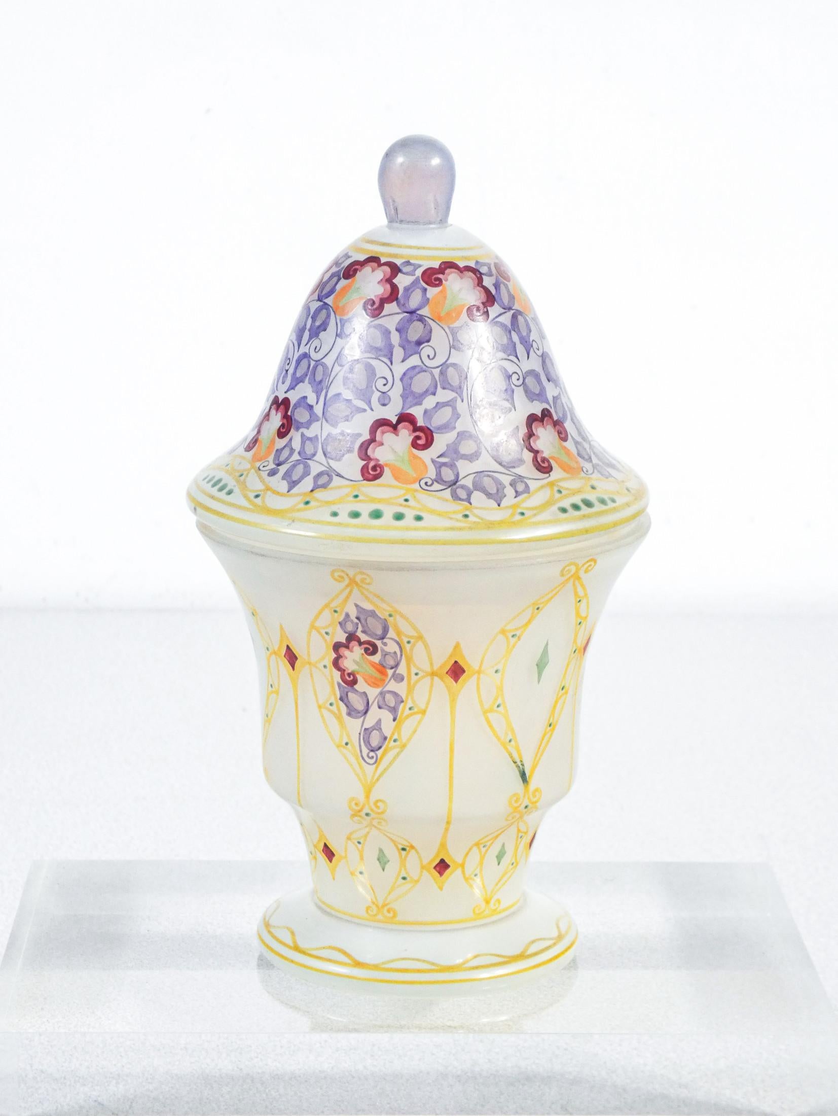 Small vase with lid in Art Nouveau style.
Hand painted opal glass

ORIGIN
France

PERIOD
Early twentieth century

MODEL
Small vase with lid

MATERIALS
Hand painted opal glass

DIMENSIONS
H 19 x Ø 10.5 cm

CONDITIONS
Perfect. No