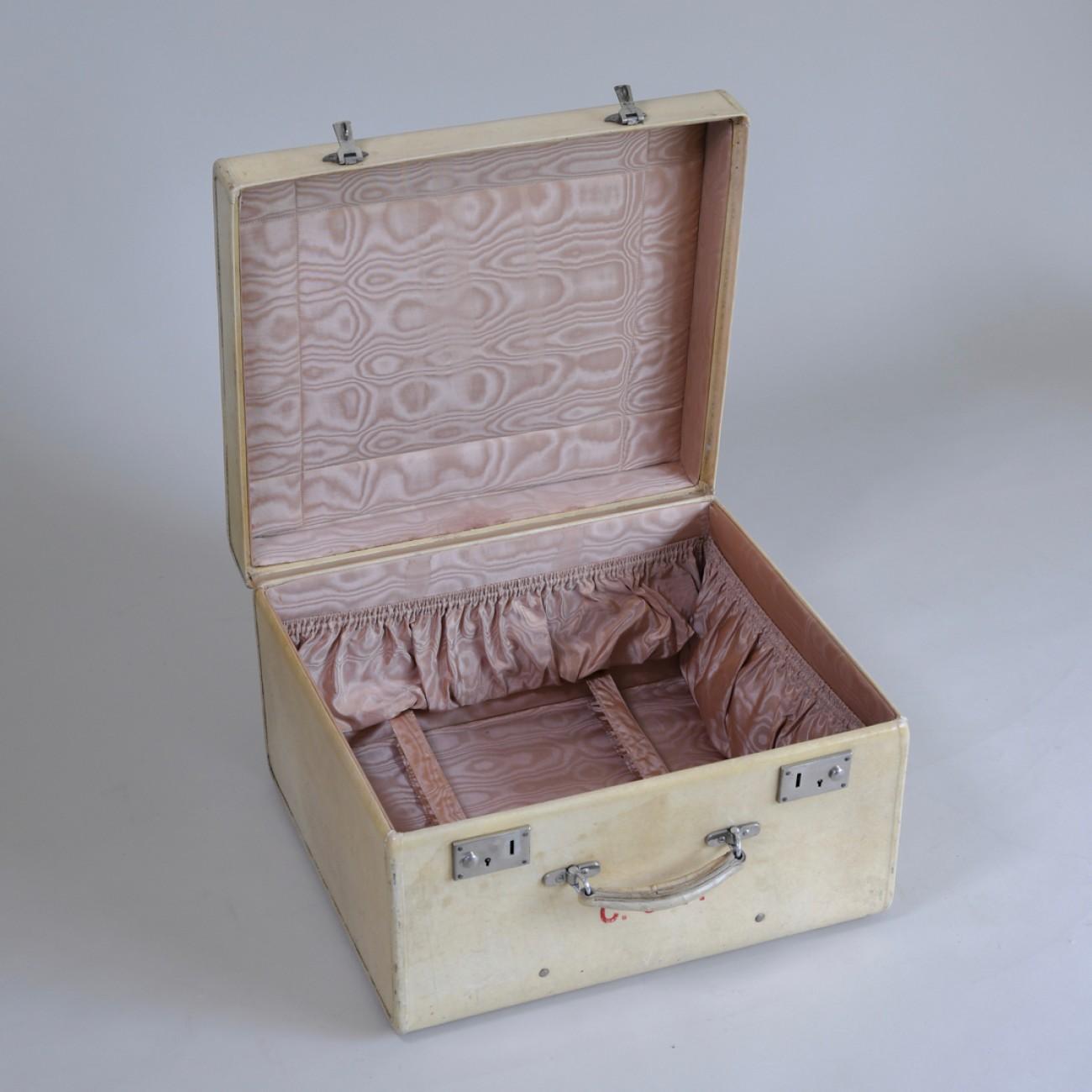 An excellent example of a case made of vellum with nickel-plated fittings and original silk lining. Also has embossed initials C.G.P., circa 1920.

Dimensions: 26.7cm/10.5 inches (height) x 45.7cm/18 inches (width) x 42cm/16.5 inches