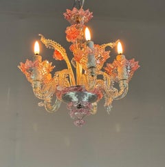 Small Venetian chandelier in colourless and red Murano glass, circa 1950