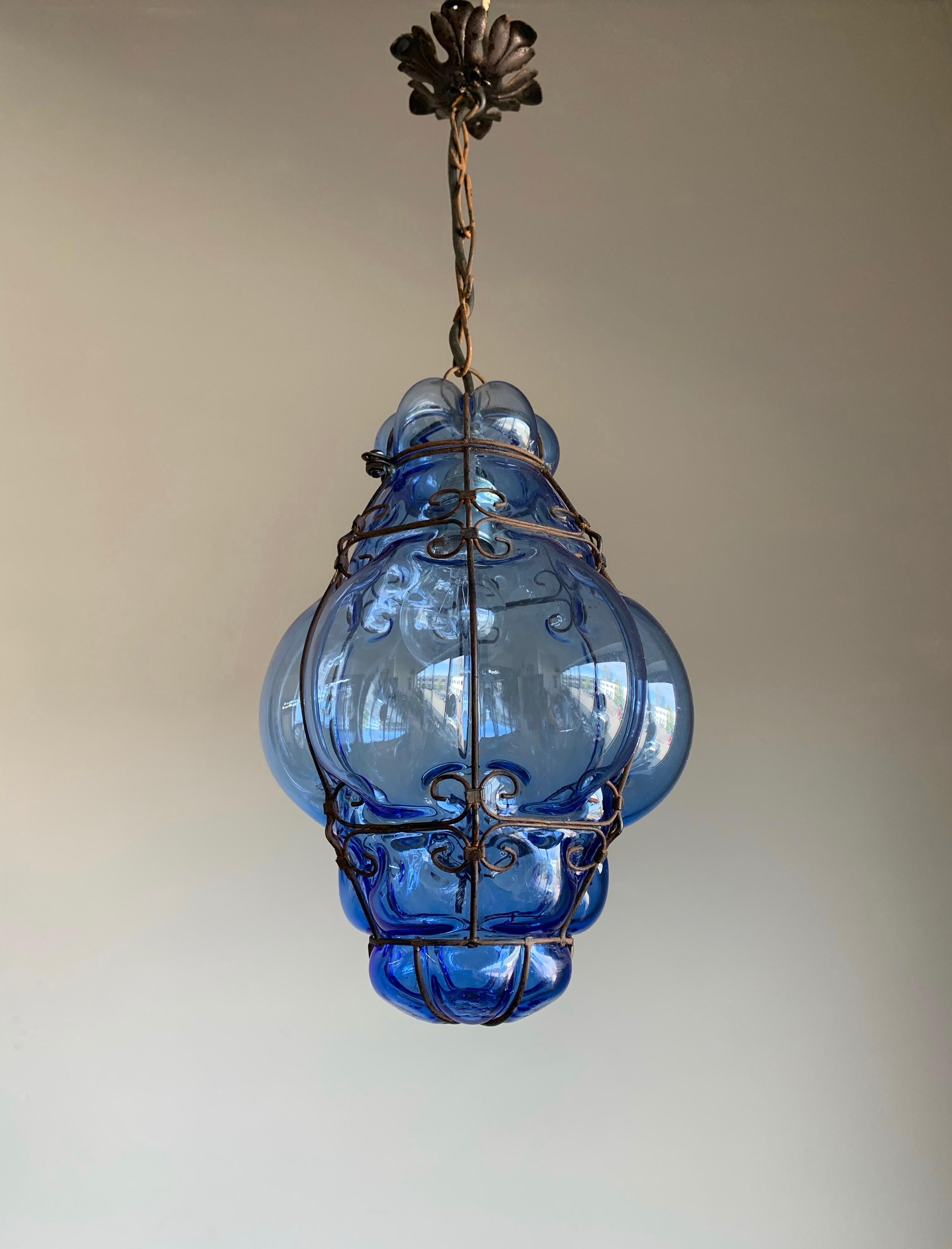 Beautiful color and practical size Italian fixture with mouth blown glass in a metal frame. 

If you are looking for a rare and stylish shape Murano light fixture to grace your home then this handmade antique specimen could be coming your way soon.