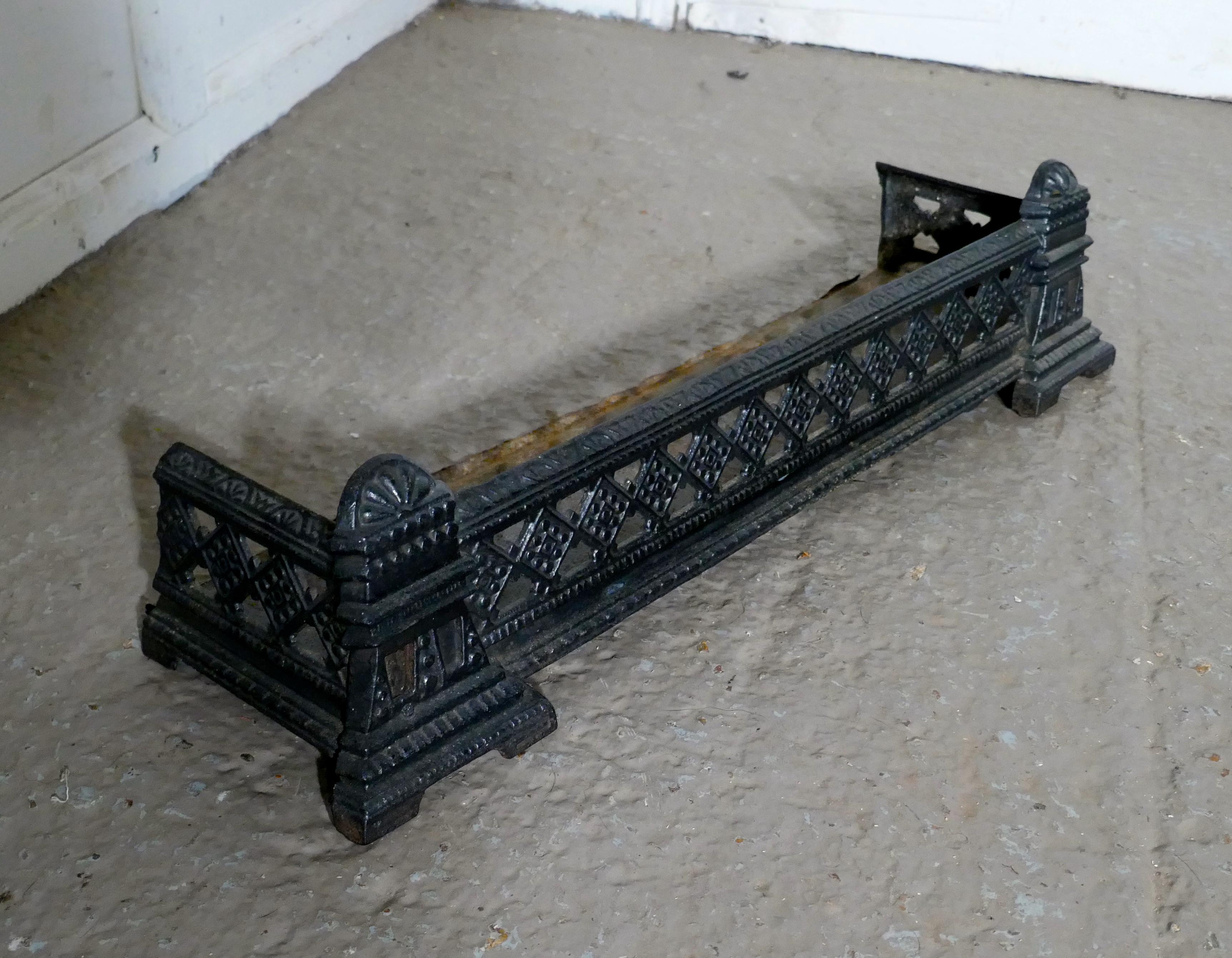 Small Victorian cast iron fender or dog grate

This is a good Victorian fender it is best quality and heavy, fenders like this were known a Dog Grates as they serve to rest the fire tools and keep any rolling ash in check
The fender is in good