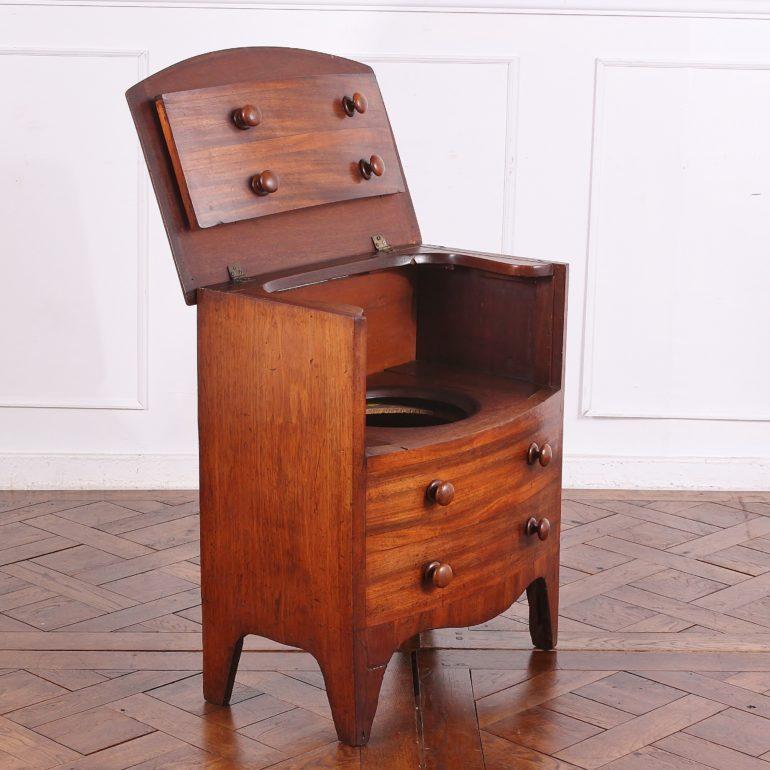 Small Victorian ‘commode’ or pot cupboard in mahogany, circa 1890. Lovely curved bow front, with a smaller footprint for many different locations in the home.



  