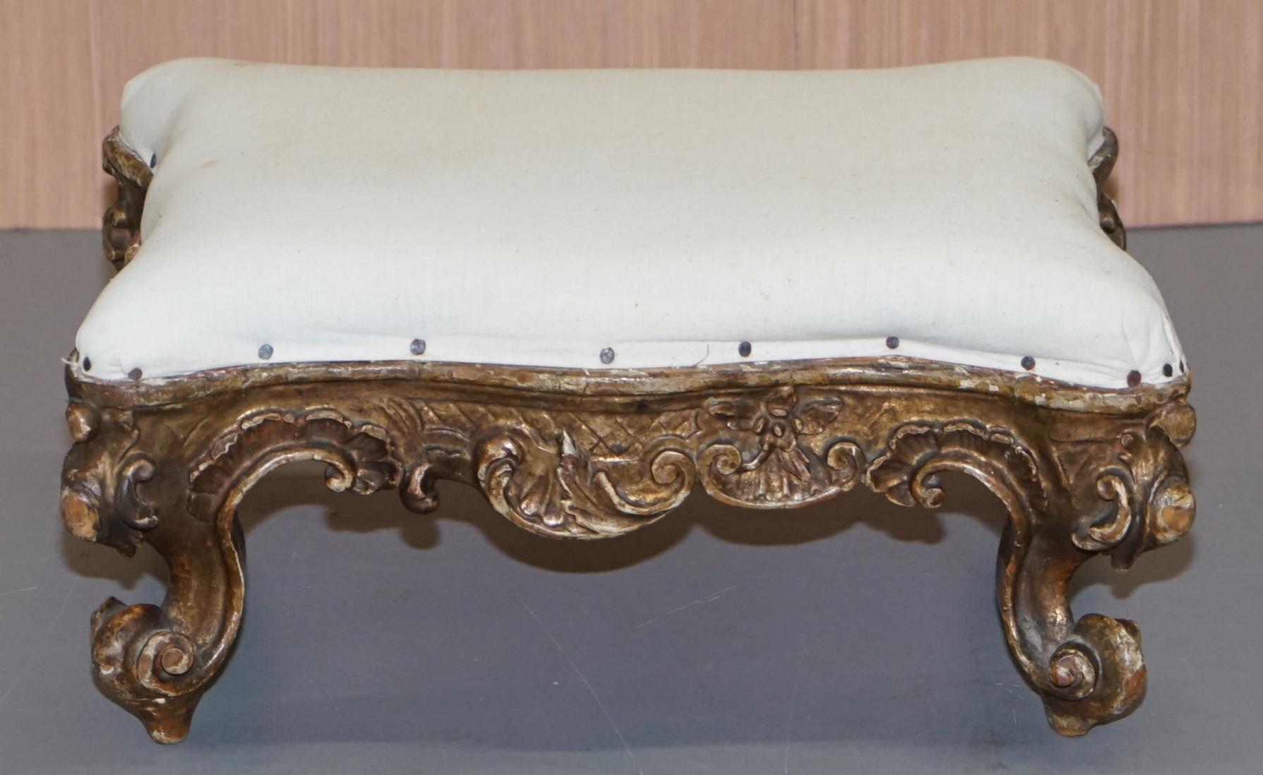 We are delighted to offer for sale this stunning small giltwood Victorian footstool hand carved all over

A good looking and well made piece with period gilt wood, its been stripped lined and is ready for upholstery. This can be upholstered in a