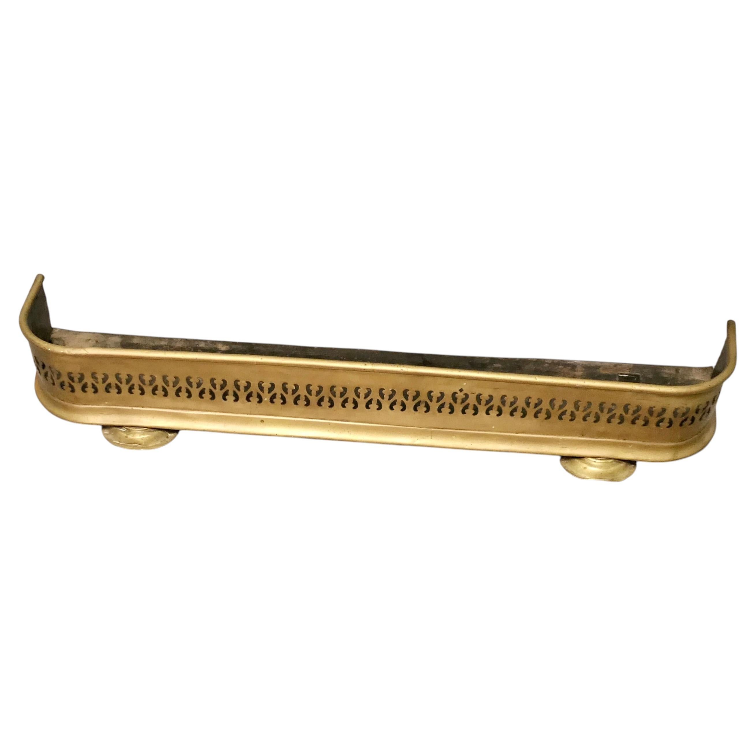 Small Victorian Pierced Brass Fender This is a Victorian Pierced Brass Fender For Sale