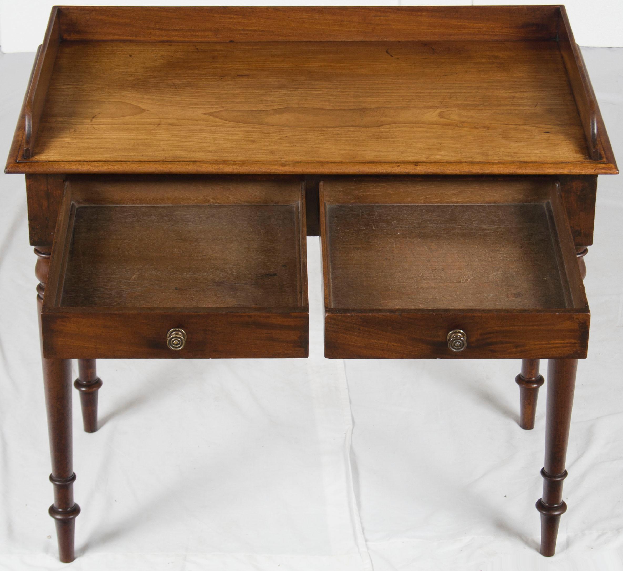 Fresh over from England, this small side desk provides function in tiny spaces. Probably made sometime, circa 1890, this piece works equally well in both the office, bedroom, or living room. Whether used to compliment an existing desk or provide a